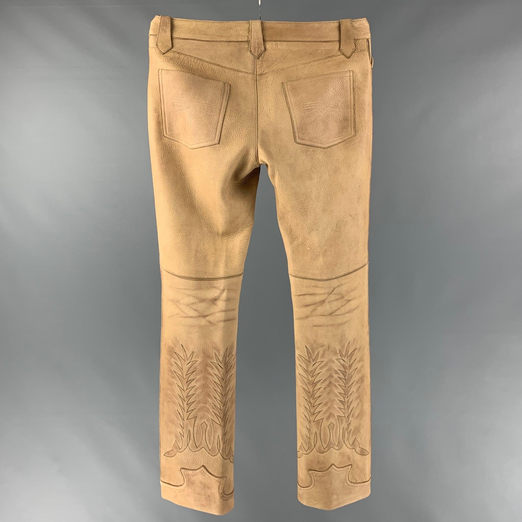 RALPH LAUREN BLUE LABEL by casual pants comes in a beige leather featuring a western style, embroidered detail, and a zip fly closure. Excellent Pre-Owned Condition. 

Marked:   10 

Measurements: 
  Waist: 34 inches Rise: 9 inches Inseam: 34 inches
