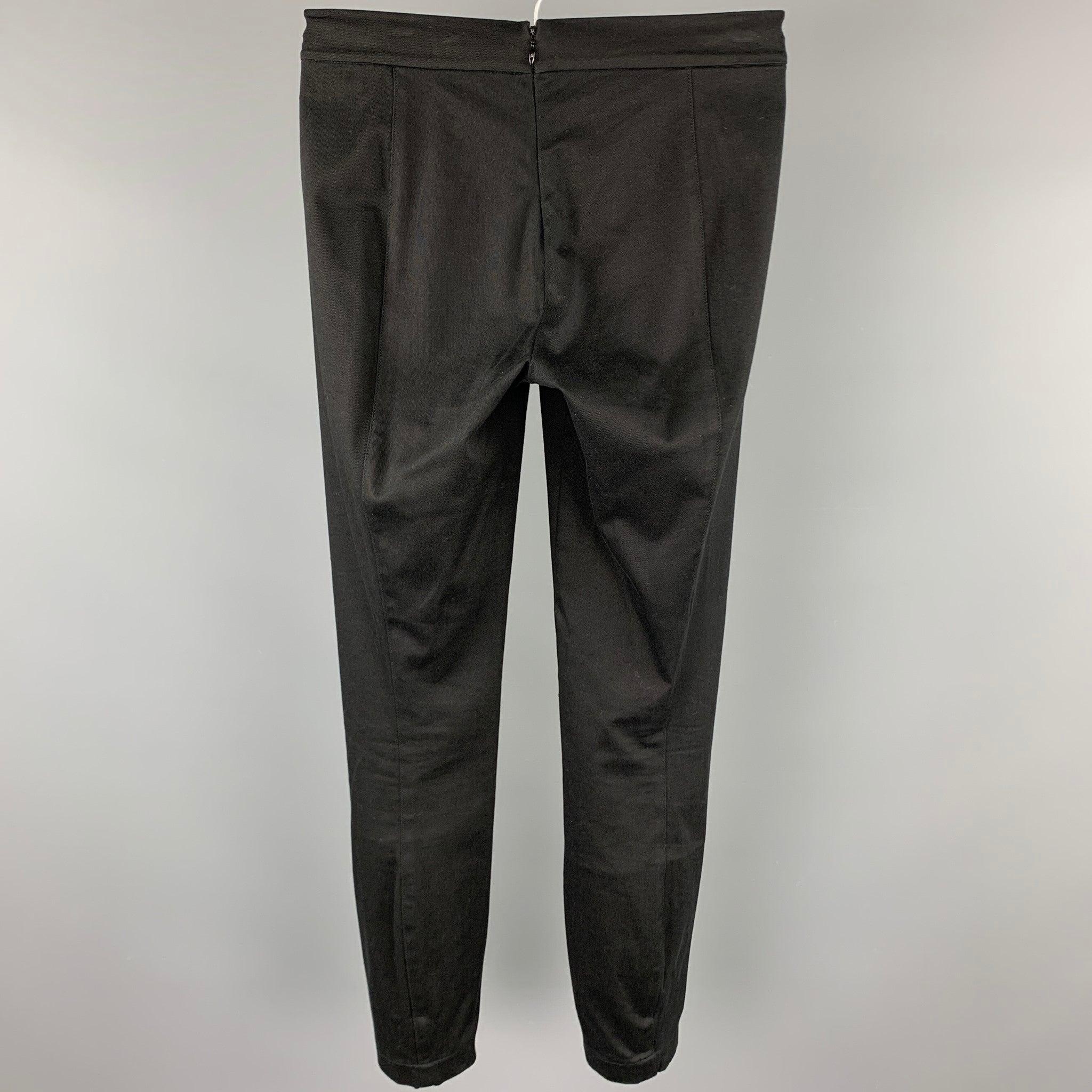 RALPH LAUREN Blue Label leggings comes in a black / elastane featuring a back zipper closure.Very Good
Pre-Owned Condition. 

Marked:   2 

Measurements: 
  Waist: 27 inches  Rise: 9 inches  Inseam: 28 inches 
  
  
 
Reference: 92890
Category: