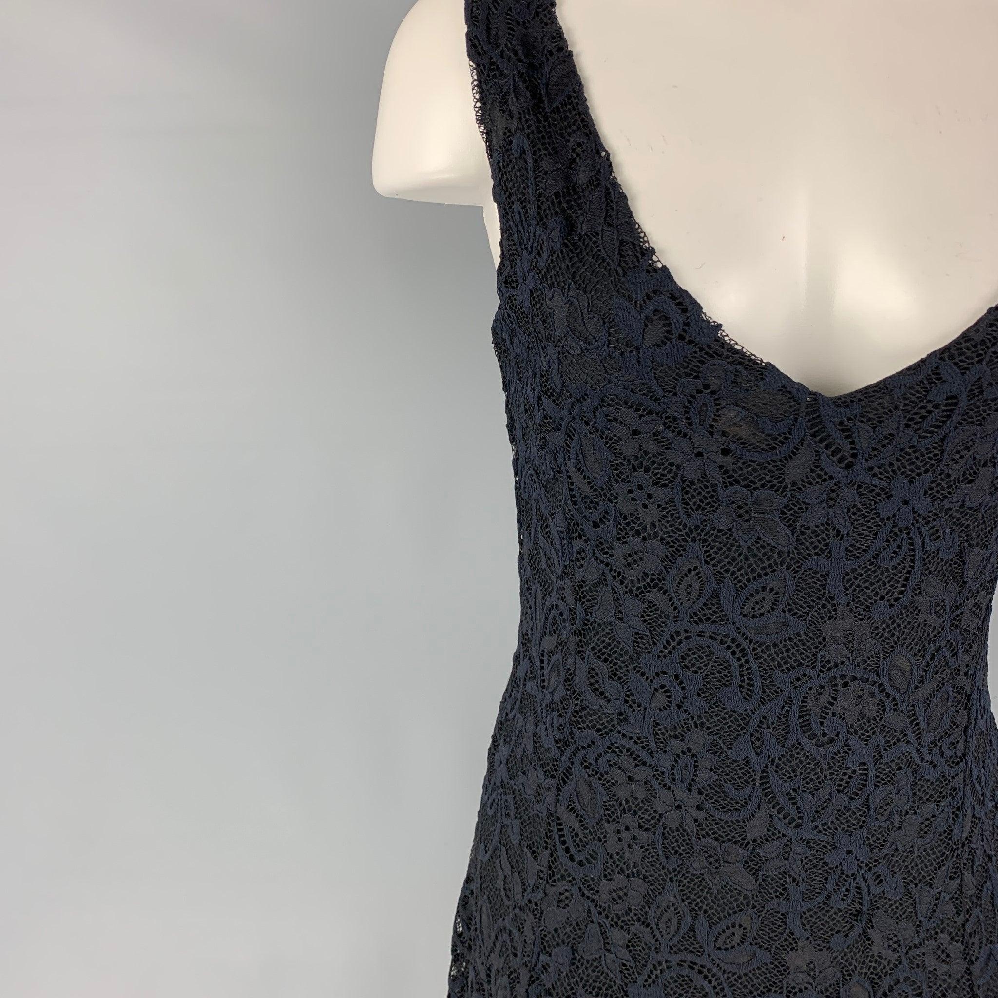 RALPH LAUREN Blue Label dress comes in a navy lace nylon with a slip liner featuring an a-line style, sleeveless, and a v-neck.
Excellent
Pre-Owned Condition. 

Marked:   L  

Measurements: 
  Bust: 30 inches Waist: 28 inches Hip: 36 inches Length: