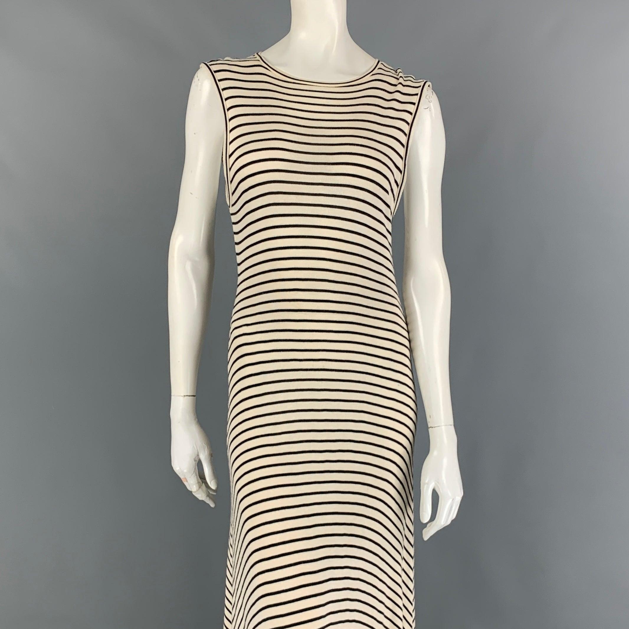 RALPH LAUREN 'Blue Label' long dress comes in a cream & black stripe cotton featuring a sleeveless style and a crew-neck.
Very Good
Pre-Owned Condition. 

Marked:   M 

Measurements: 
 
Shoulder: 17 inches  Bust: 30 inches  Waist: 30 inches  Hip:
38