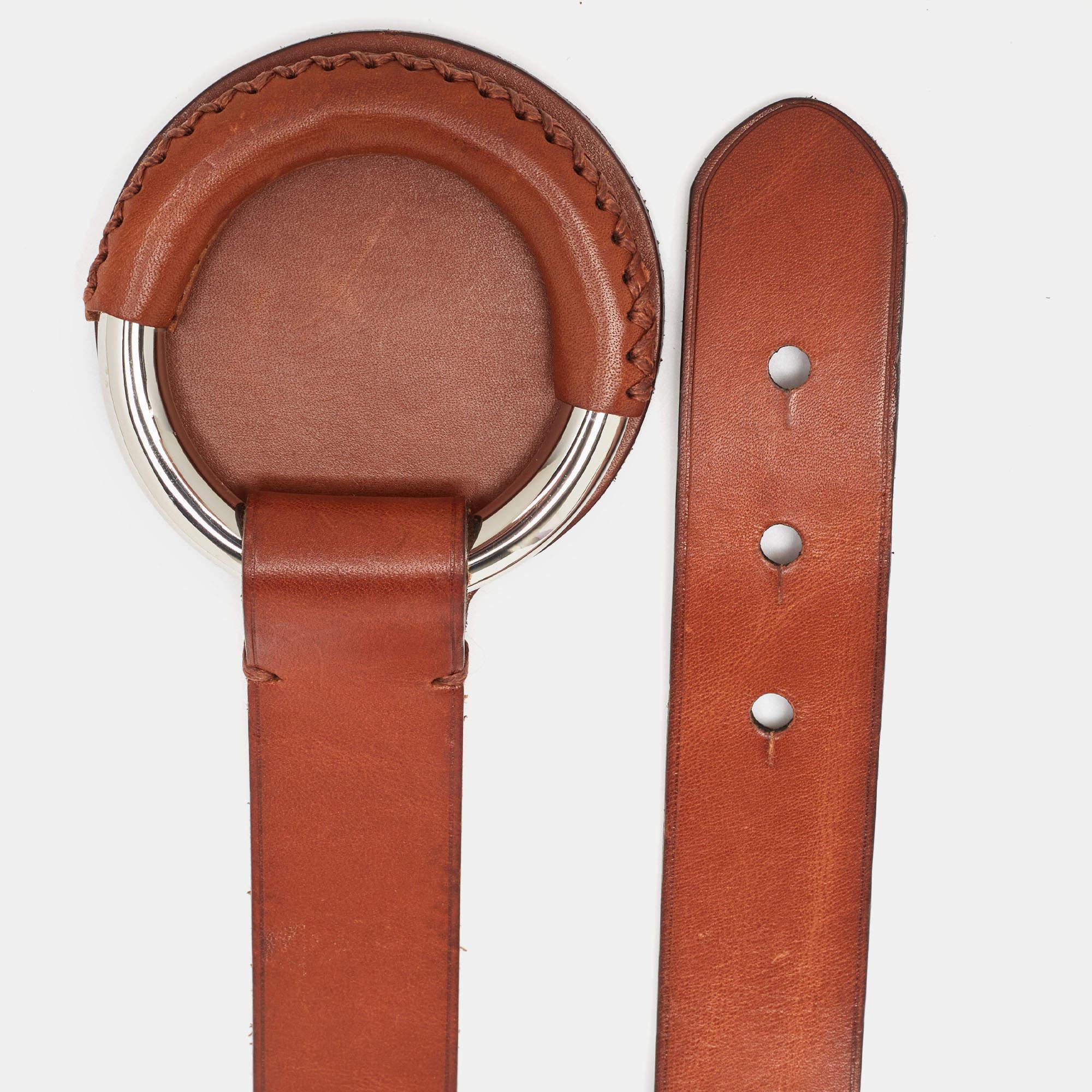 A classic add on to your collection of belts is this designer piece. Cut to a convenient length the belt has a smooth finish and a sturdy built. It will continually complement your style.
