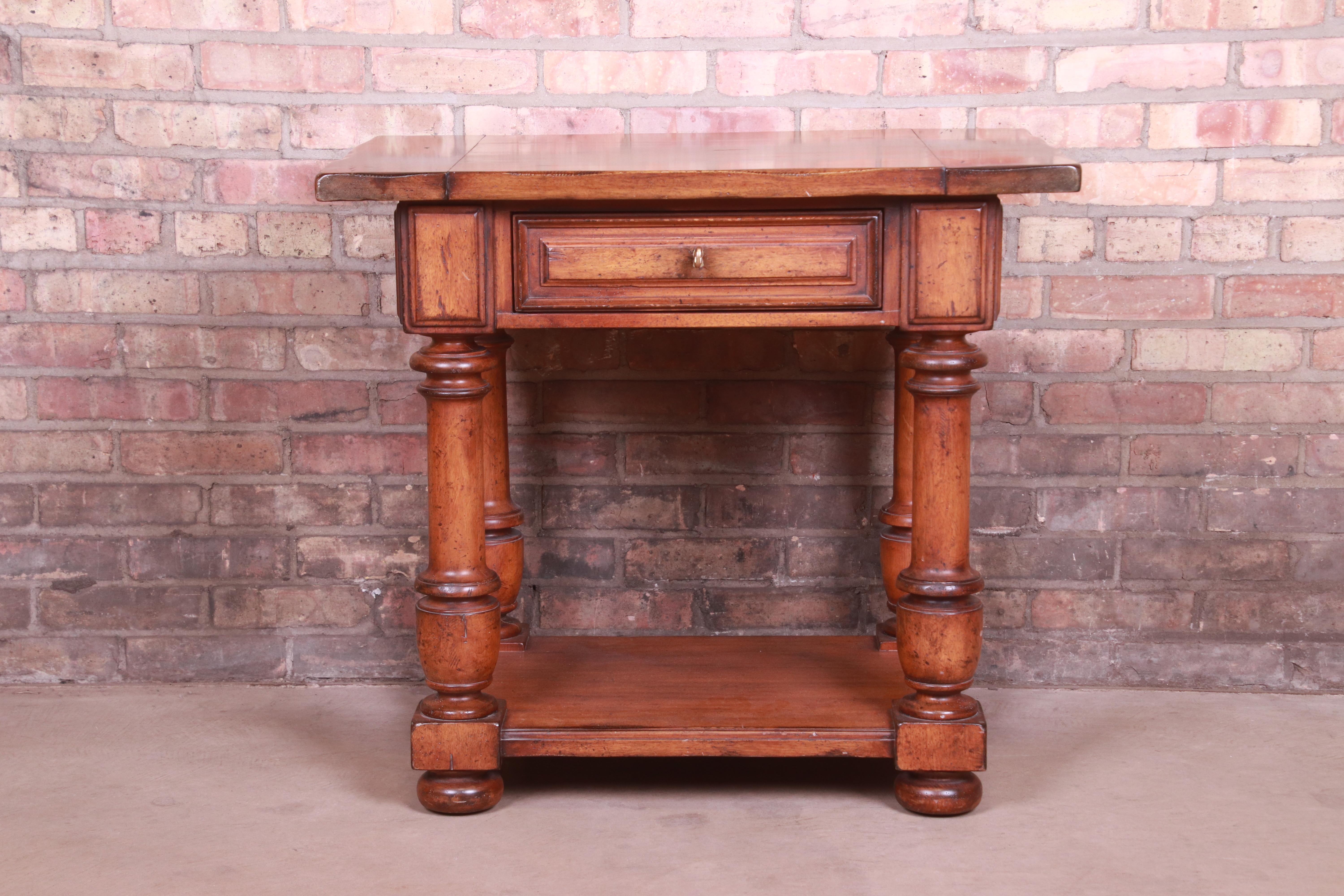 A gorgeous rustic carved walnut occasional side table or nightstand

By Ralph Lauren 