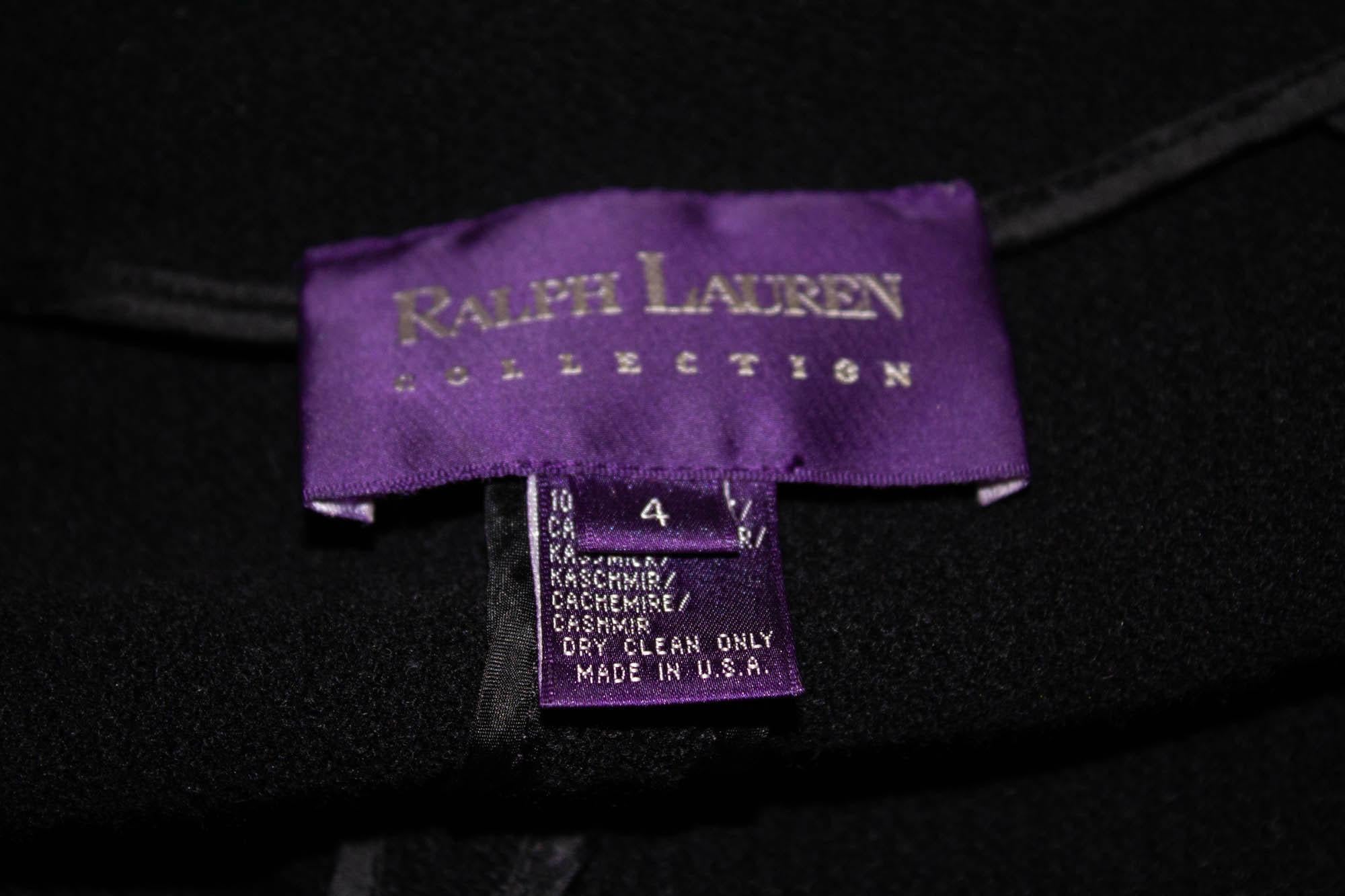 A chic cashmere jacket by Ralph Lauren Collection. The jacket is in 100 % cashmere and made in the US. It has a button front opening and 2 small pockets at hip leval. US size 4 , measurements Bust 34/5'', length 24''