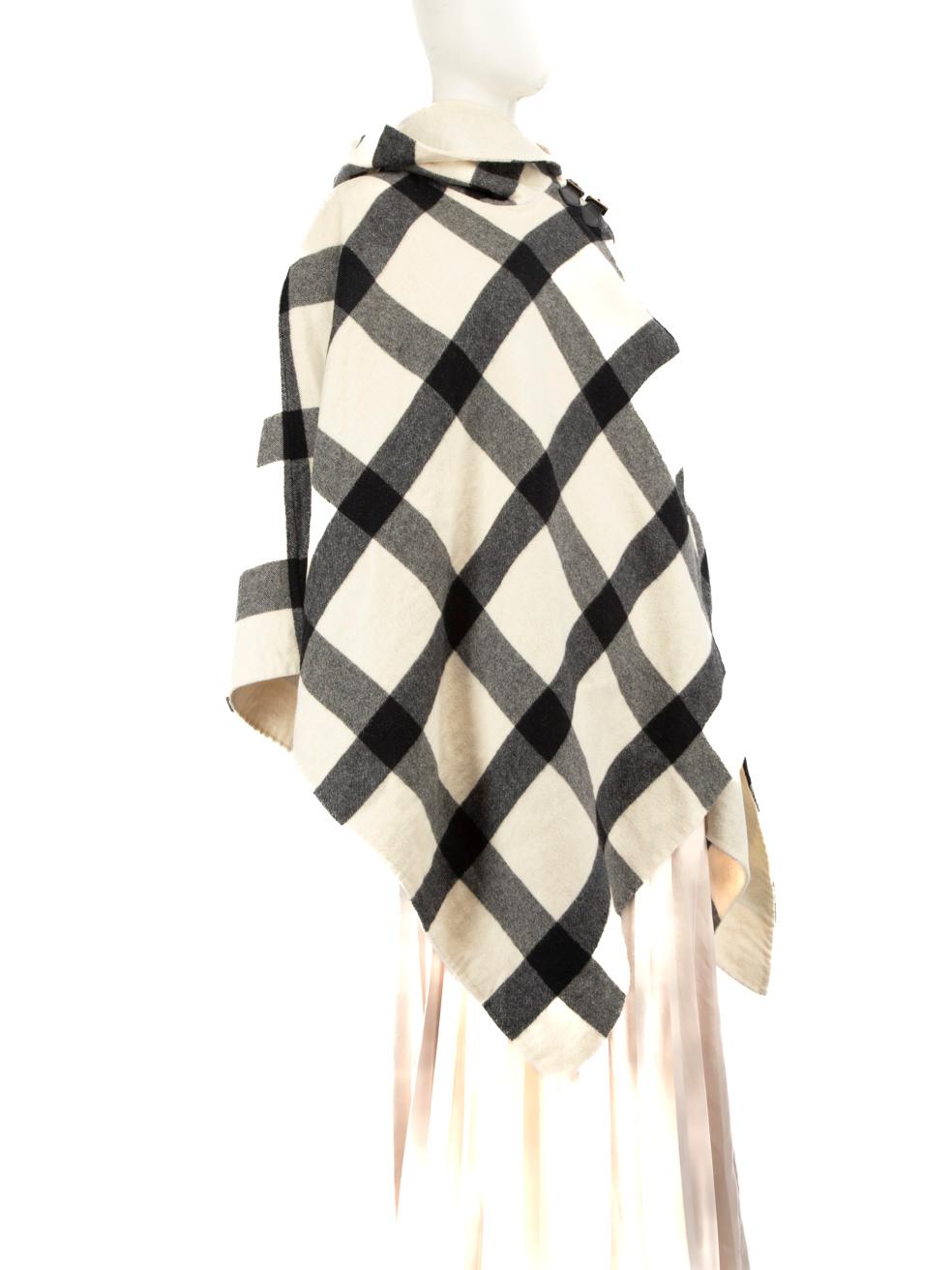 CONDITION is Very good. Hardly any visible wear to cape is evident on this used Ralph Lauren designer resale item.
 
 Details
 Multicolour
 Cashmere
 Cape
 Checkered print
 Mid length
 Hooded
 Button and buckle fastening
 
 
 Made in USA
 
