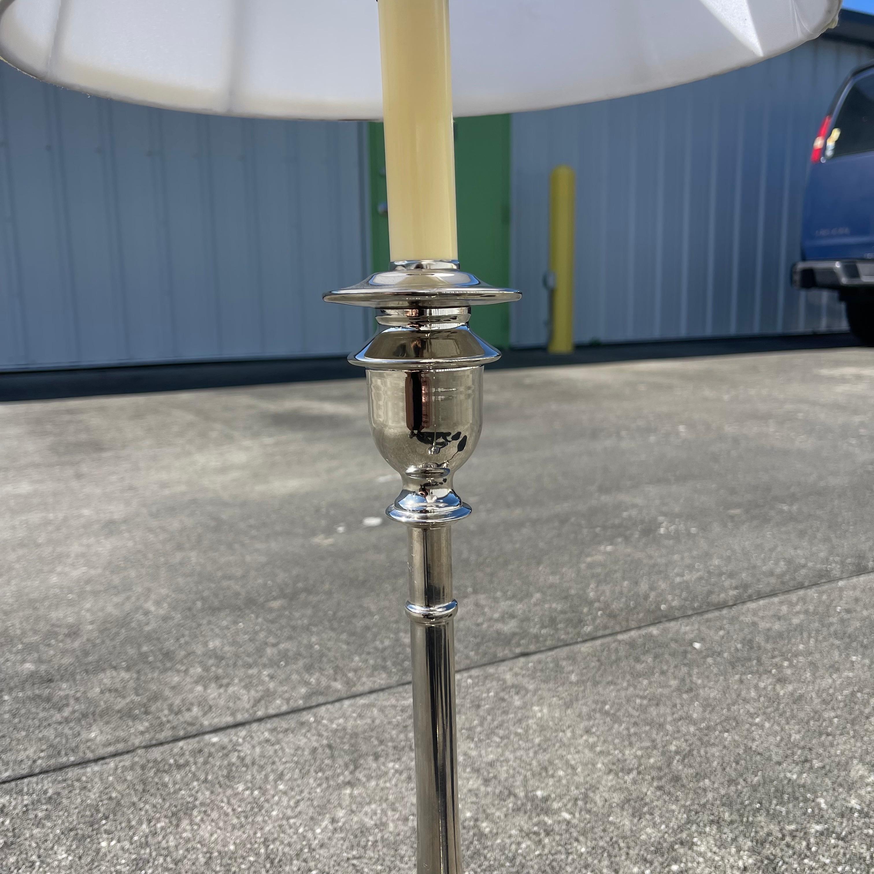 Fabulous, classically styled pair of candlestick lamps by Ralph Lauren.

Given measurements include lampshade. Lamp base diameter measures 7.5”.

Shade height is 9.5”