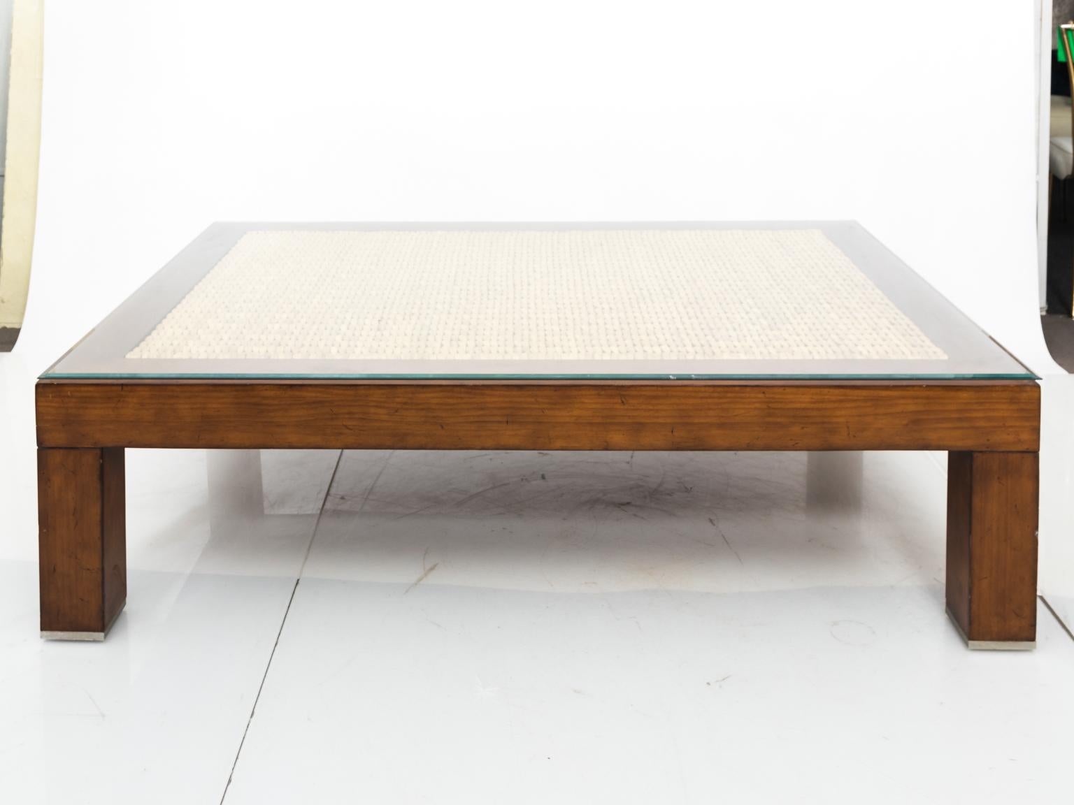 Ralph Lauren coffee table with woven rush panel and glass top, circa late 20th century. Please note of wear consistent with age due to daily use including minor surface scratches.