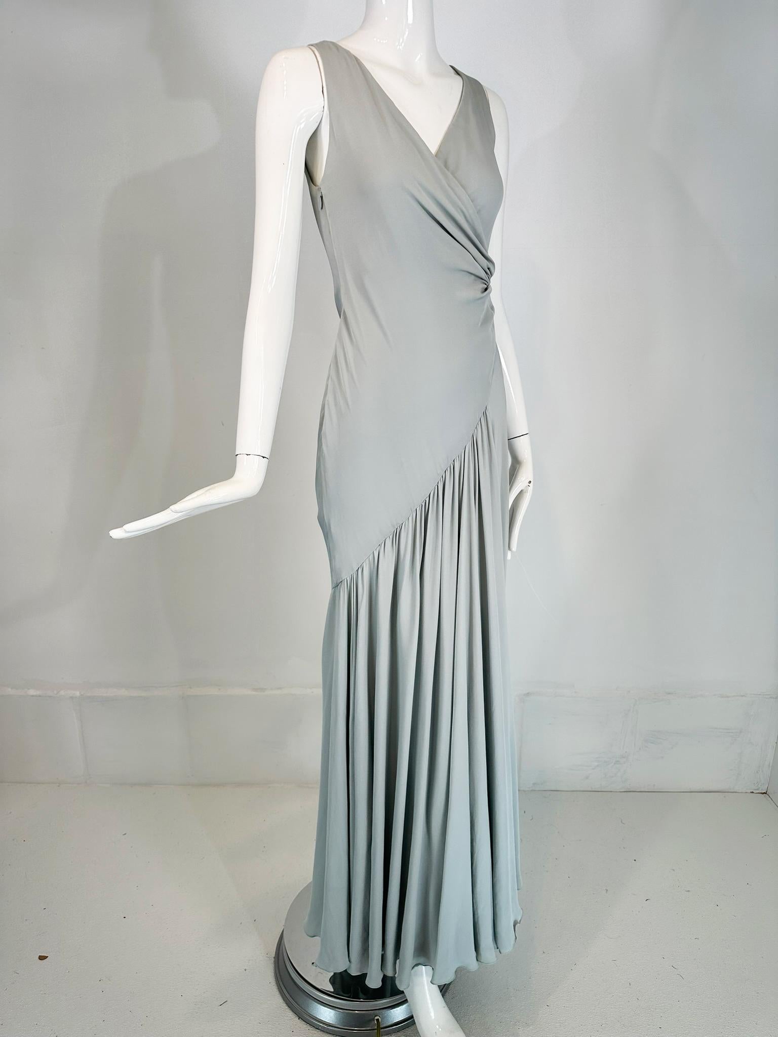 Ralph Lauren Collection Purple Label, 1930s inspired pale blue silk crepe, bias cut, V neck evening dress, marked size 2. 
This beautiful gown is perfect for any special occasion. Sleeveless dress has a v neck and is gathered on the bodice side.