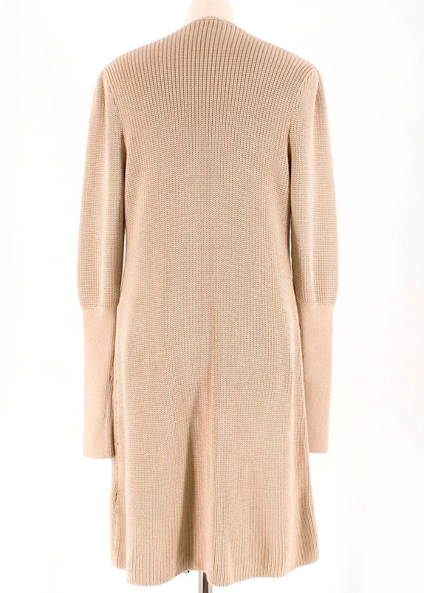 Ralph Lauren Collection - Beige Knitted Longline Cardigan

- mid / heavy knit 
- slightly padded shoulders
- loose sleeves with fitted cuffs
- longline

- 75% silk 25% cashmere
- dry clean
- made in Italy 

approx in cm
Measurements are taken laying