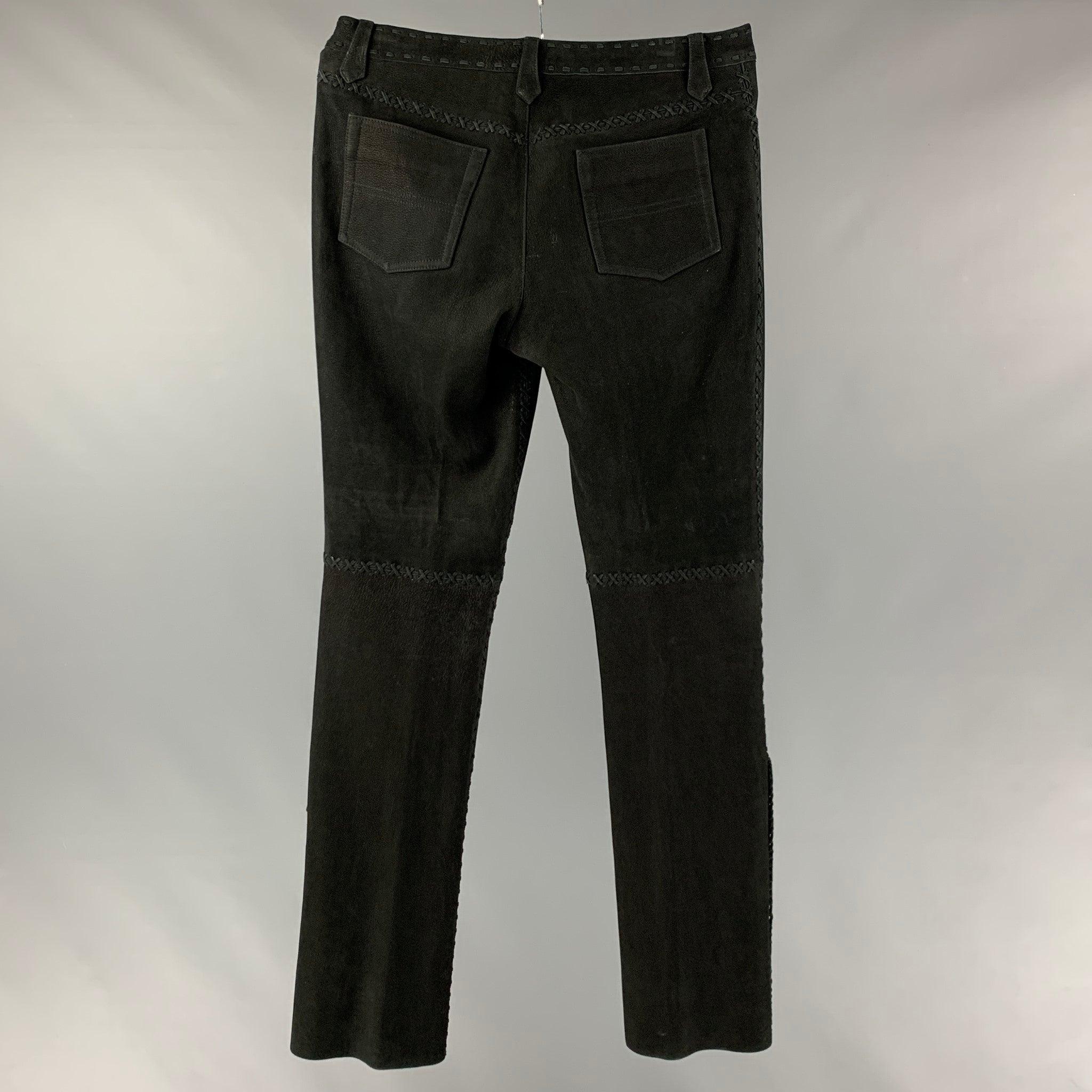 RALPH LAUREN COLLECTION by casual pants comes in a black suede featuring a western style, top stitching, concho detail, and a zip fly closure. Excellent Pre-Owned Condition. 

Marked:   no size marked 

Measurements: 
  Waist: 34 inches Rise: 10