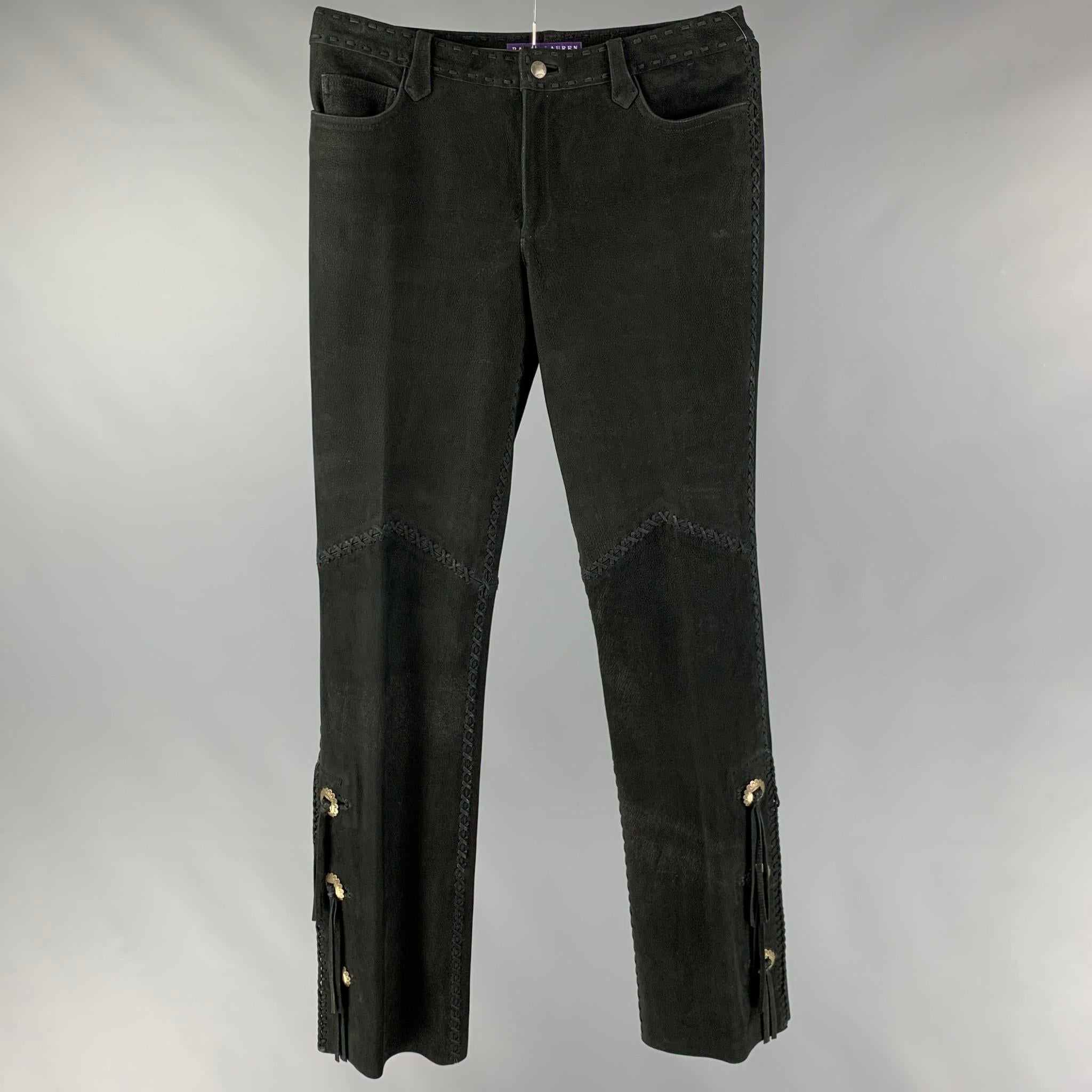 RALPH LAUREN COLLECTION by casual pants comes in a black suede featuring a western style, top stitching, concho detail, and a zip fly closure.

Excellent Pre-Owned Condition.
Marked: no size marked

Measurements:

Waist: 34 in.
Rise: 10 in.
Inseam: