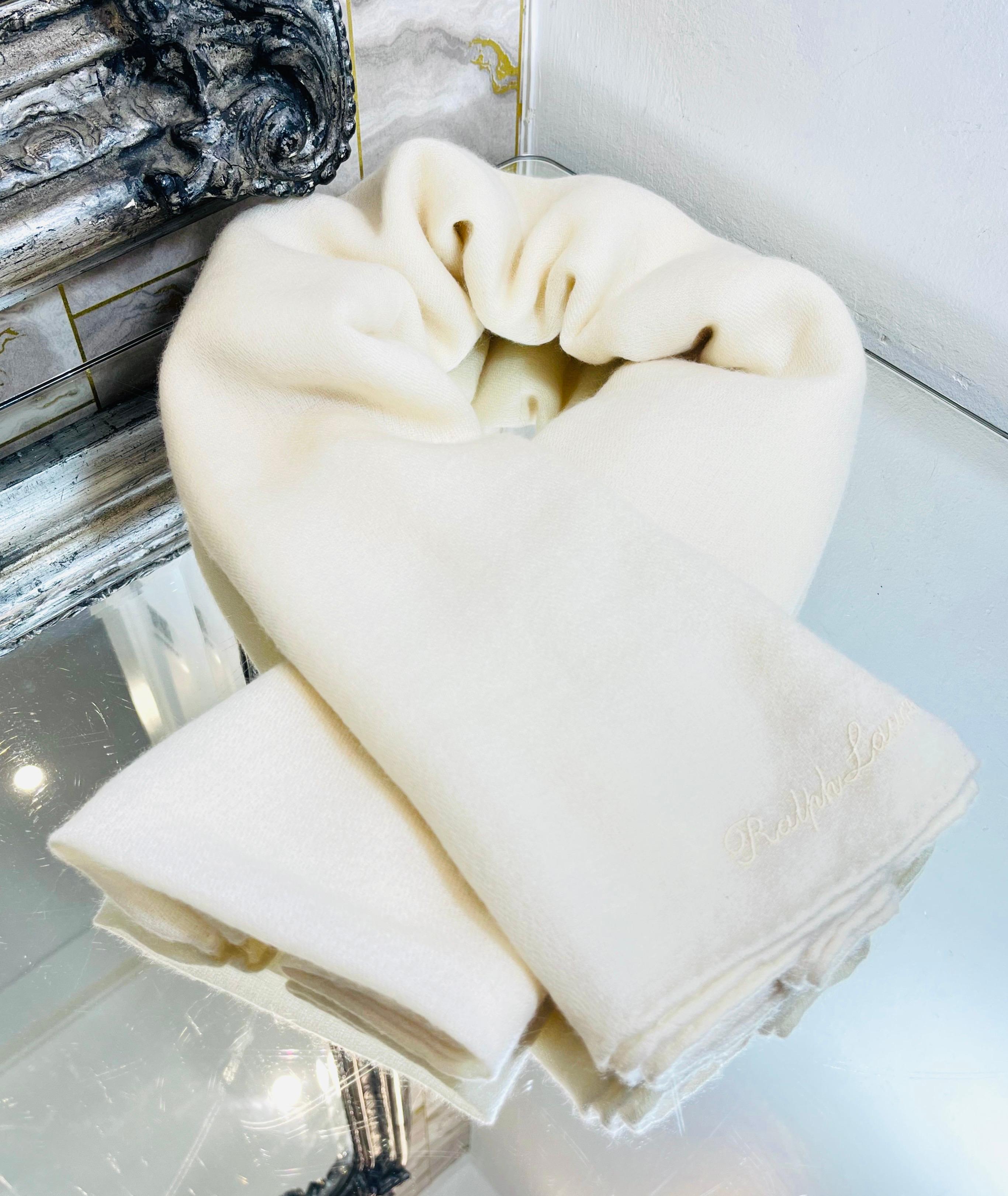 Ralph Lauren Collection Cashmere Scarf

Ivory scarf fully crafted from cashmere in Italy, detailed with sewn ends.

Featuring tonal 'Ralph Lauren' embroidery on the bottom corner. Rrp £780

Size – Length 219cm, Width 73cm

Condition – Very