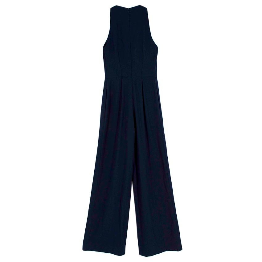 Ralph Lauren Navy Jumpsuit 

- Cut out front detail 
- Wide leg 
- Back zip fastening 
- Two side slip pockets 
- Sleeveless 

Materials:
- silk-blend 

Shoulders - 3cm
Chest - 42cm
Waist - 36cm
Length - 147cm
Inside leg - 88cm
