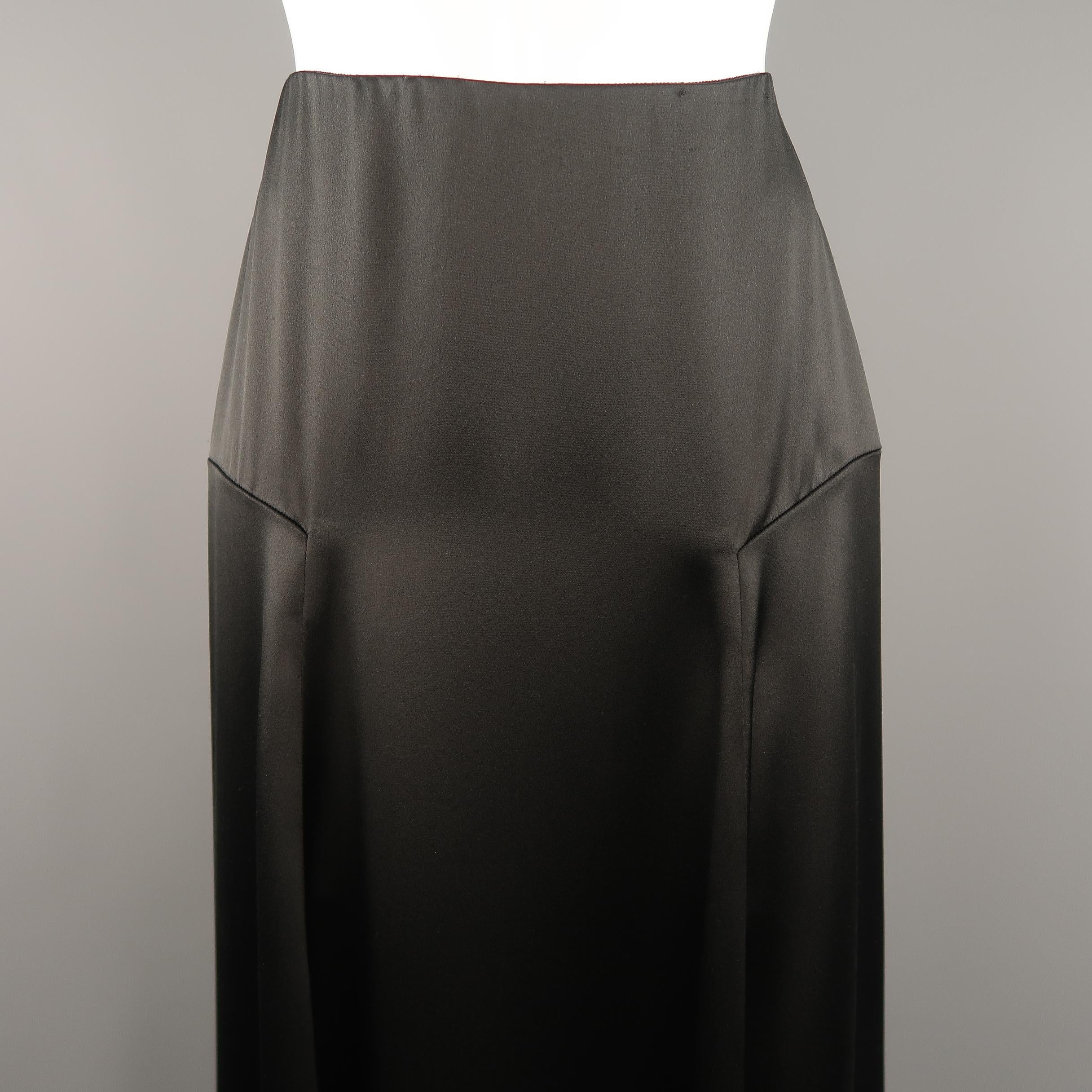 RALPH LAUREN COLLECTION maxi skirt comes in silk satin with paneled dart construction and A line ruffled hem silhouette. Minor wear.Made in USA.
 
Very Good Pre-Owned Condition.
Marked: 2
 
Measurements:
 
Waist: 26.5 in.
Hip: 36 in.
Length: 40-46