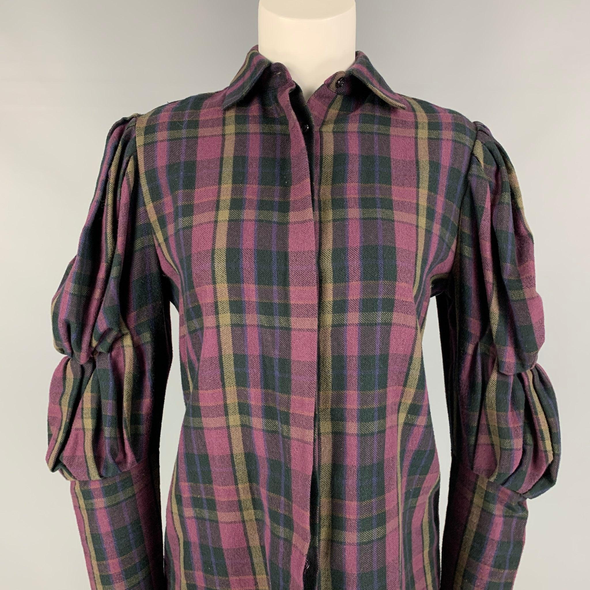 RALPH LAUREN Collection blouse comes in a purple & taupe plaid cotton featuring pleated sleeves, spread collar, and a hidden placket closure.
Very Good
Pre-Owned Condition. 

Marked:   4 

Measurements: 
 
Shoulder: 14.5 inches  Bust: 36 inches 