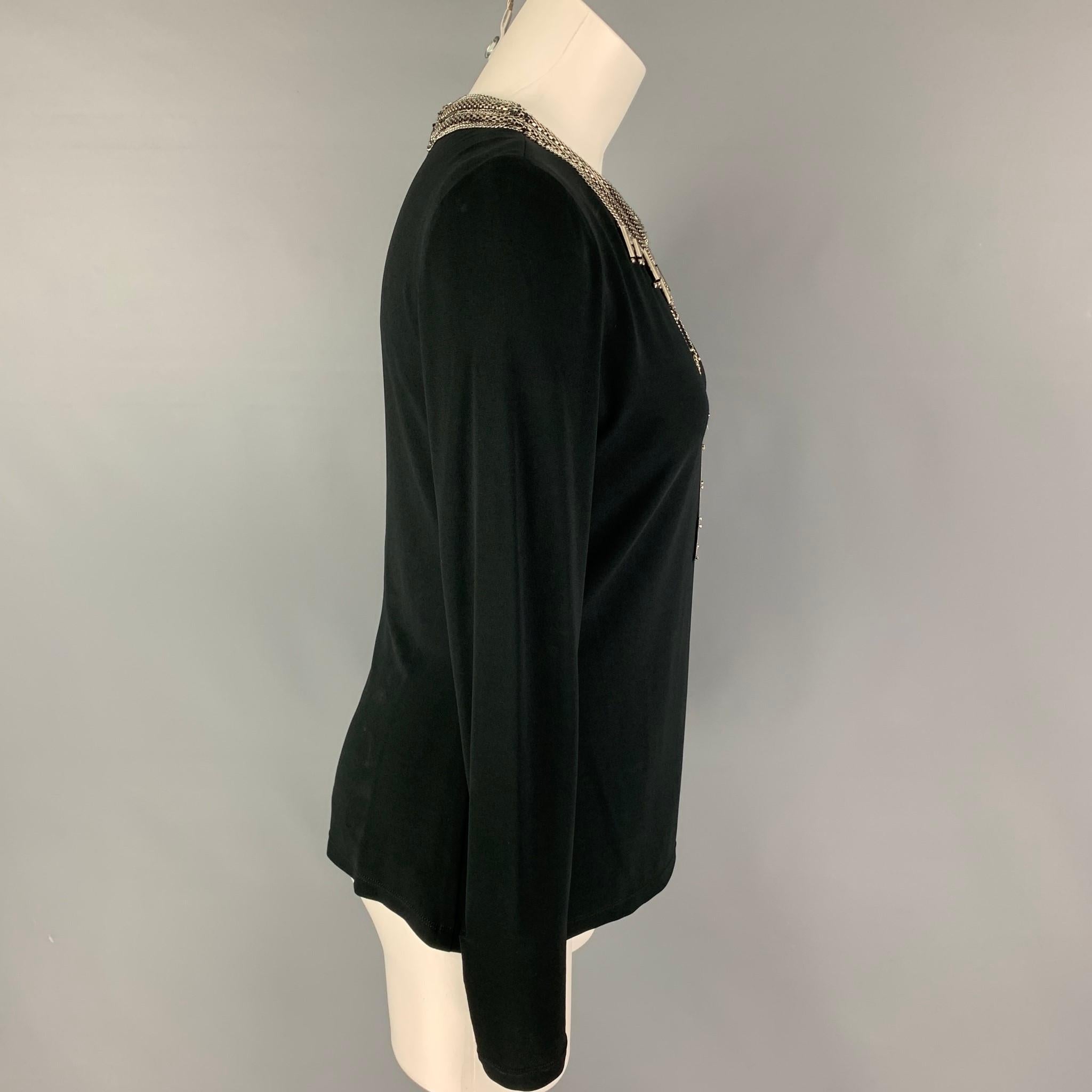 RALPH LAUREN Collection dress top comes in a black viscose featuring a front silver tone metal embellished design and a back zip up closure. 

Very Good  Pre-Owned Condition.
Marked: 6

Measurements:

Shoulder: 15 in.
Bust: 34 in.
Sleeve: 27
