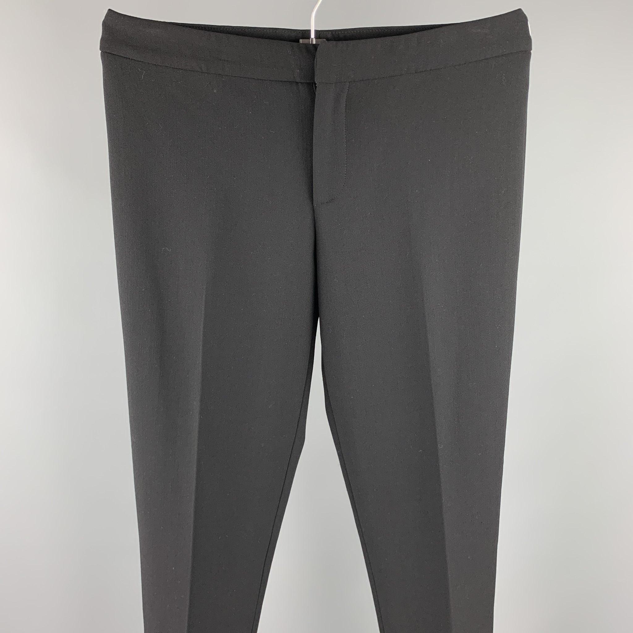 RALPH LAUREN COLLECTION dress pants comes in a black fabric featuring a straight leg, front tab, and a zip fly closure.Excellent
Pre-Owned Condition. 

Marked:   6 

Measurements: 
  Waist: 32 inches 
Rise: 8.5 inches 
Inseam: 31 inches 
  
  
