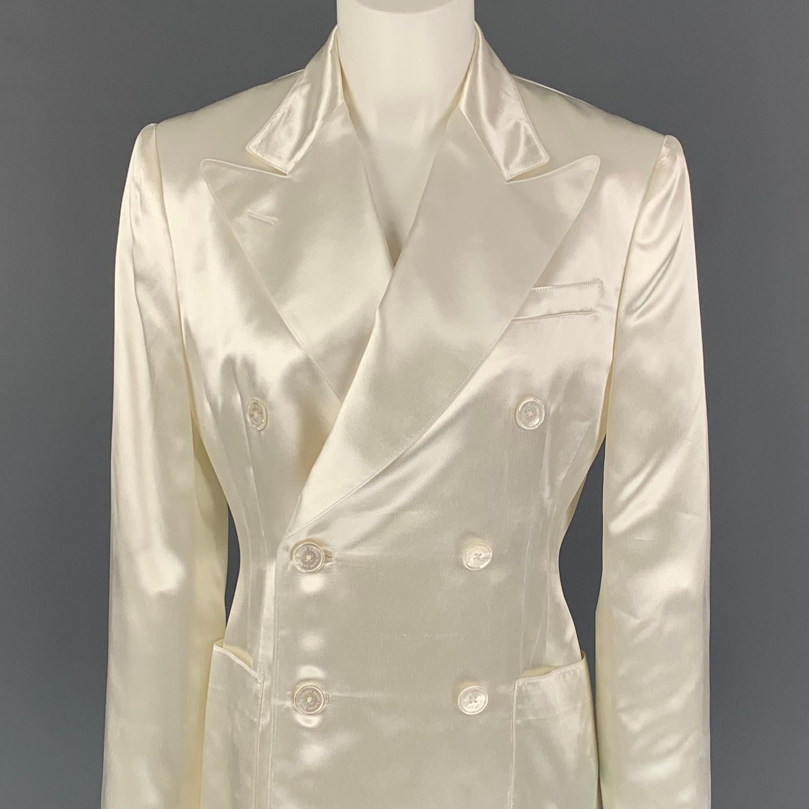 RALPH LAUREN 'Purple Label' blazer comes in a cream acetate with a full liner featuring a peak lapel, patch pockets, and a double breasted closure. Made in USA. 

Very Good Pre-Owned Condition.
Marked: 6

Measurements:

Shoulder: 16 in.
Bust: 36