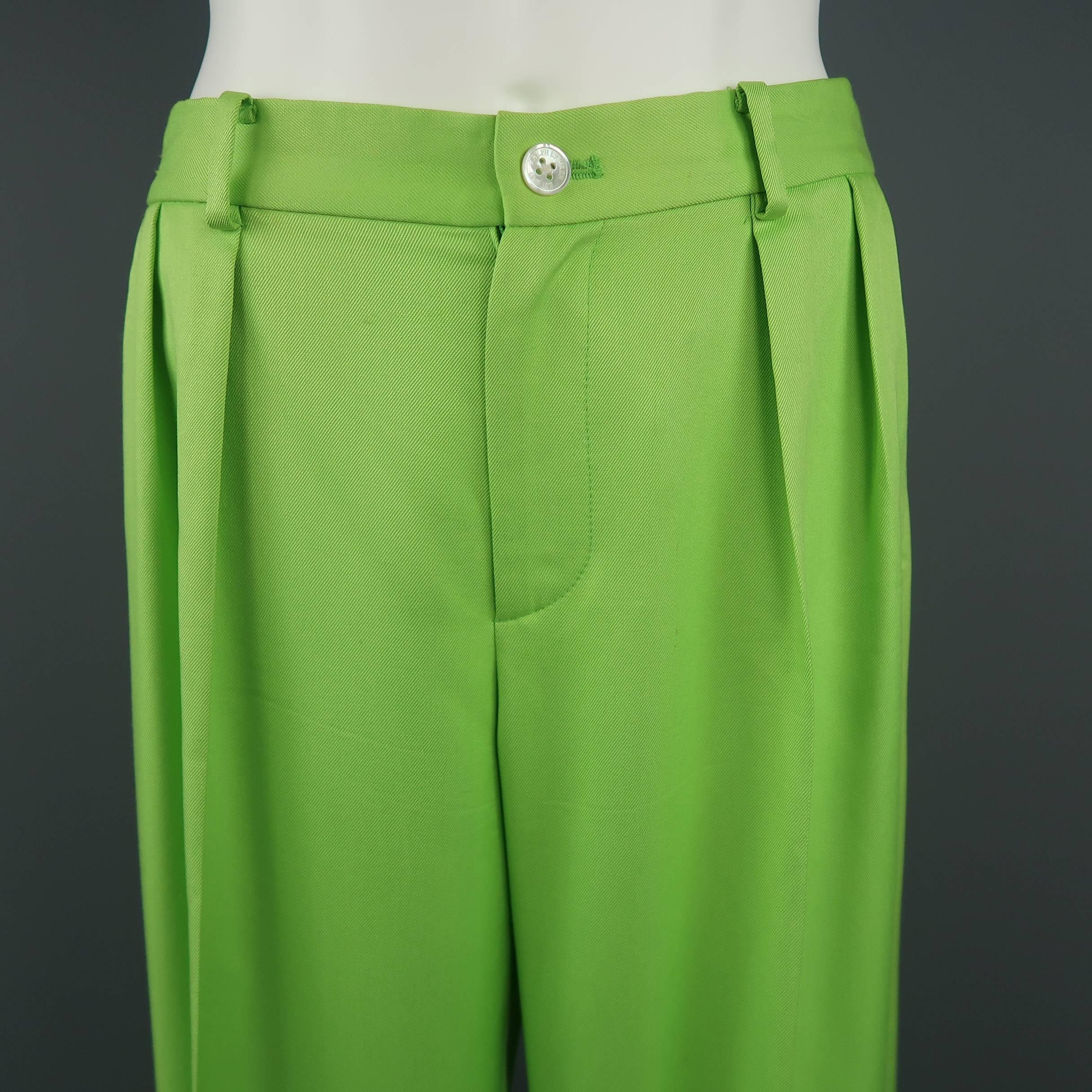RALPH LAUREN COLLECTION dress pants come in a light green silk twill with a double pleat front, wide leg and cuffed hem. Discolorations shown in detail shots. As-is. Made in USA.
 
Fair Pre-Owned Condition.
Marked: 6
 
Measurements:
 
Waist: 31