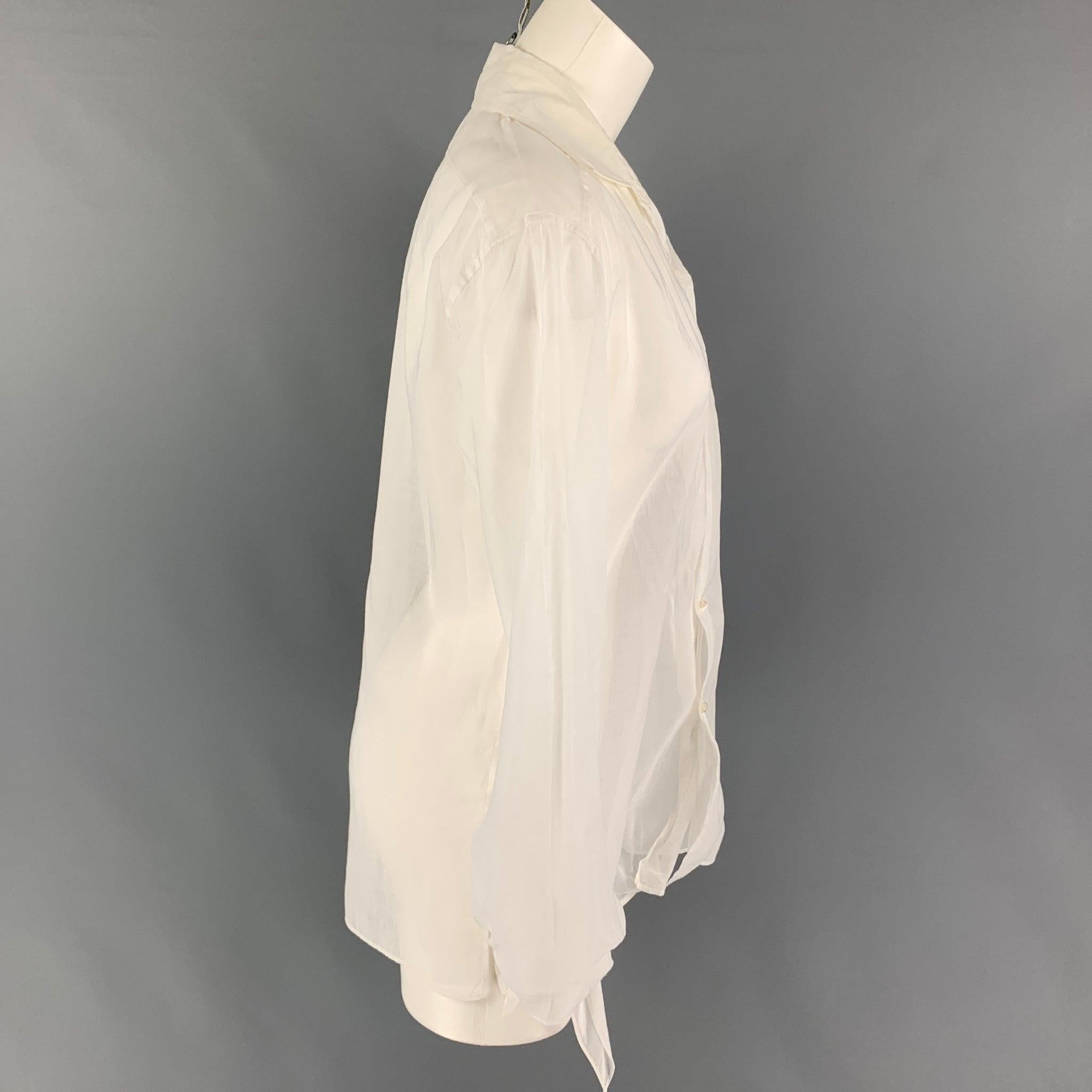 RALPH LAUREN 'Collection' blouse comes in a white see though cotton featuring self-tie cuff details, embroidered logo, patch pocket, and a button up closure. Made in Italy. Very Good
Pre-Owned Condition. 

Marked:   6 

Measurements: 
 
Shoulder: 18