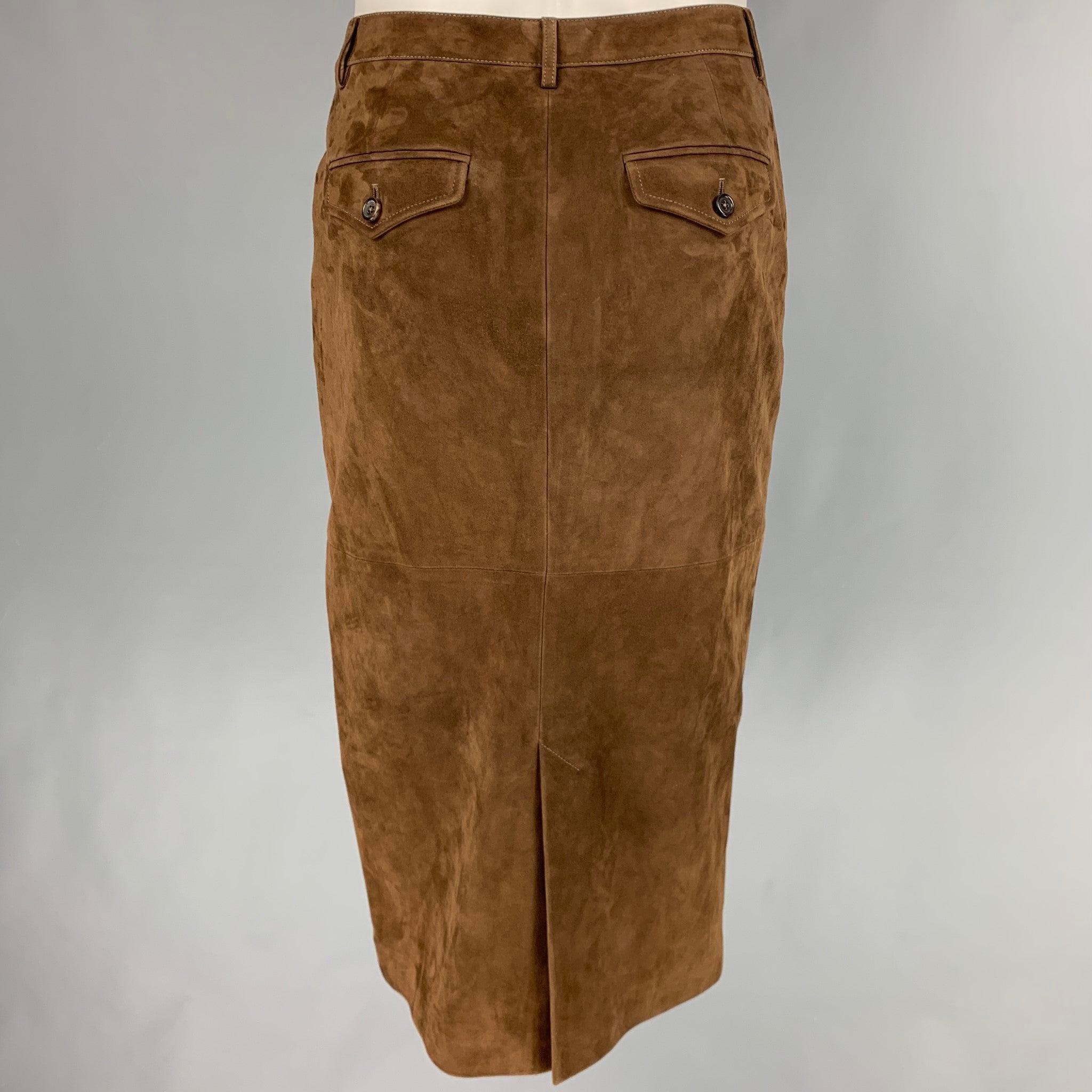 RALPH LAUREN COLLECTION skirt
in a brown suede fabric featuring a mid-calf length, pencil style, and a button closure. Made in Italy. Excellent Pre-Owned Condition. 

Marked:   8 

Measurements: 
  Waist: 30 inches Hip: 35 inches Length: 29 inches 
