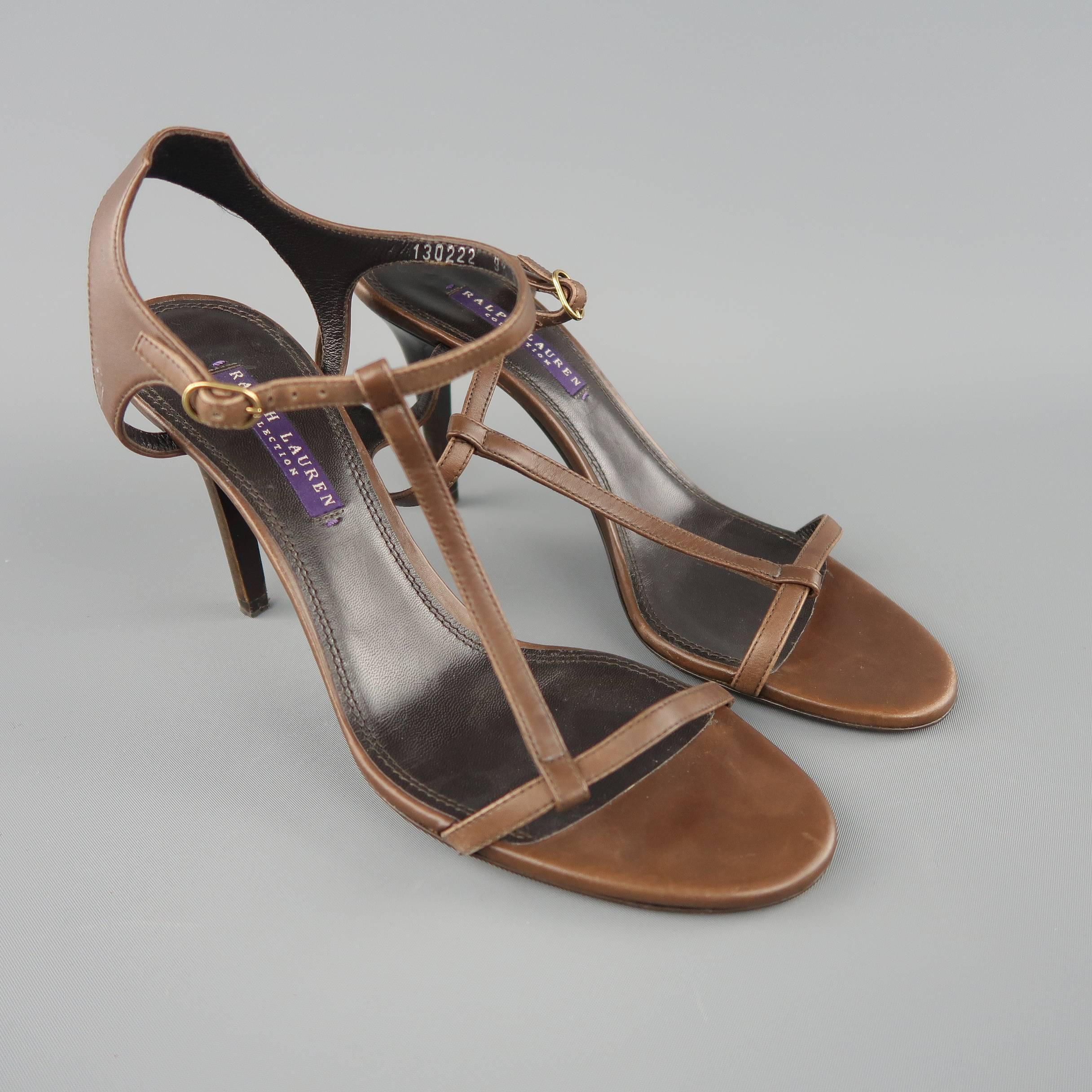 RALPH LAUREN COLLECTION sandals come in brown leather with an ankle harness and T strap. Made in Italy.
 
Good Pre-Owned Condition.
Marked: IT 39.5
 
Measurements:
 
Heel: 4 in.
