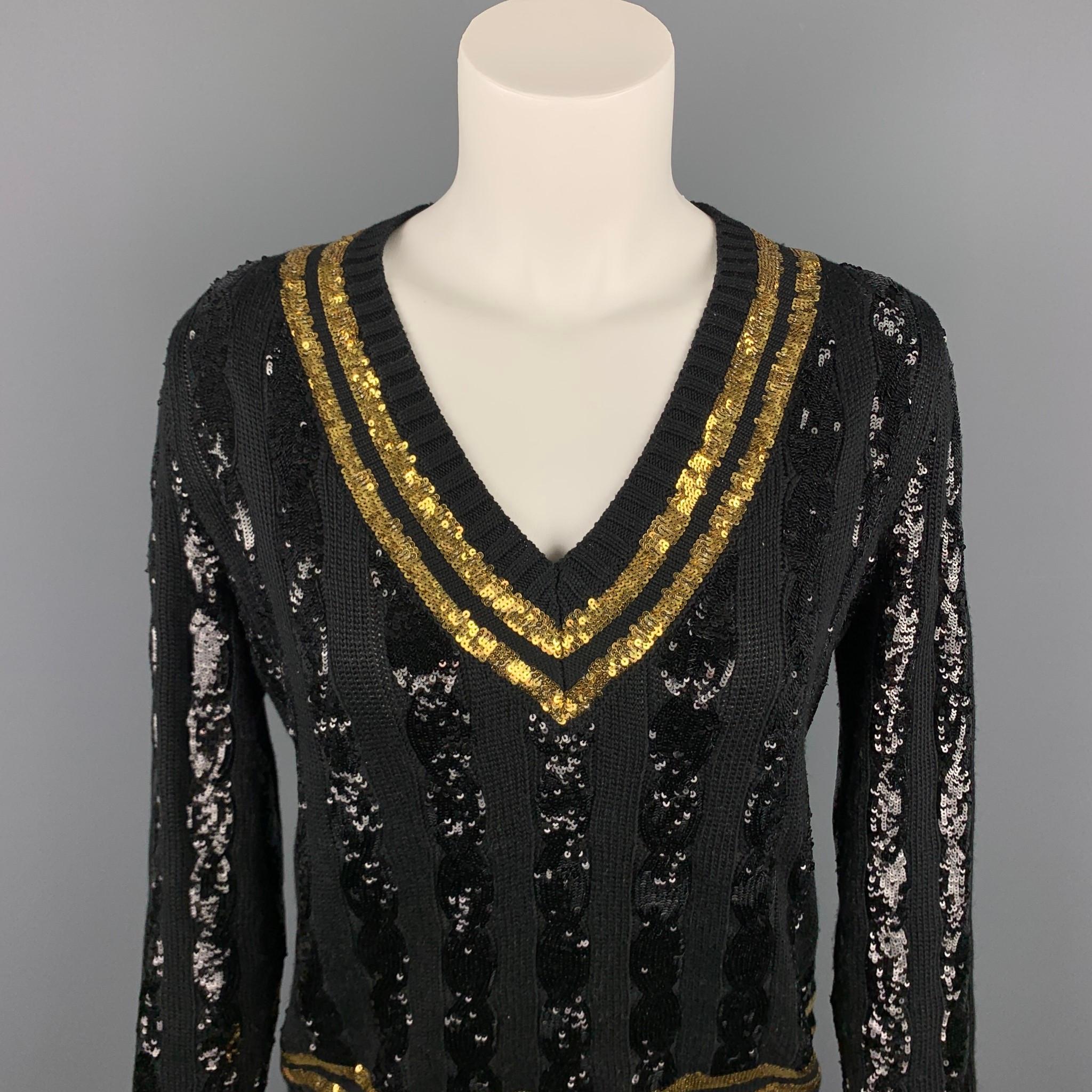 RALPH LAUREN Collection sweater comes in a black & gold stripe sequined silk featuring a v-neck.

Very Good Pre-Owned Condition.
Marked: M

Measurements:

Shoulder: 16 in.
Bust: 38 in.
Sleeve: 25 in.
Length: 23 in. 