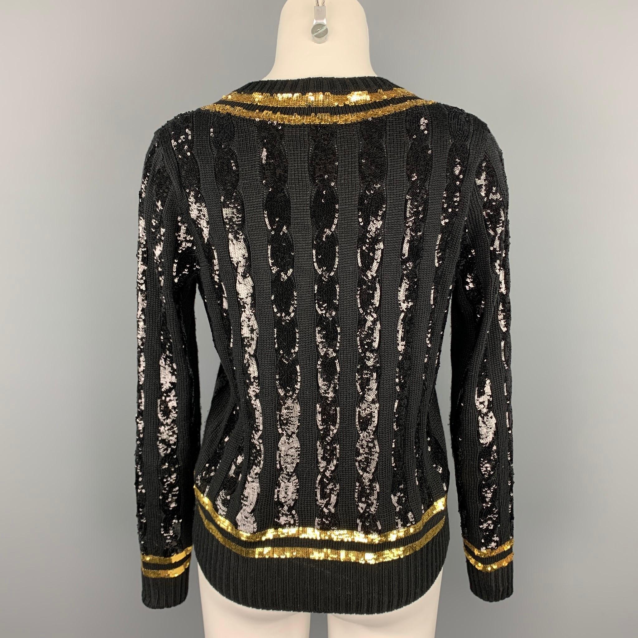 black and gold sweaters