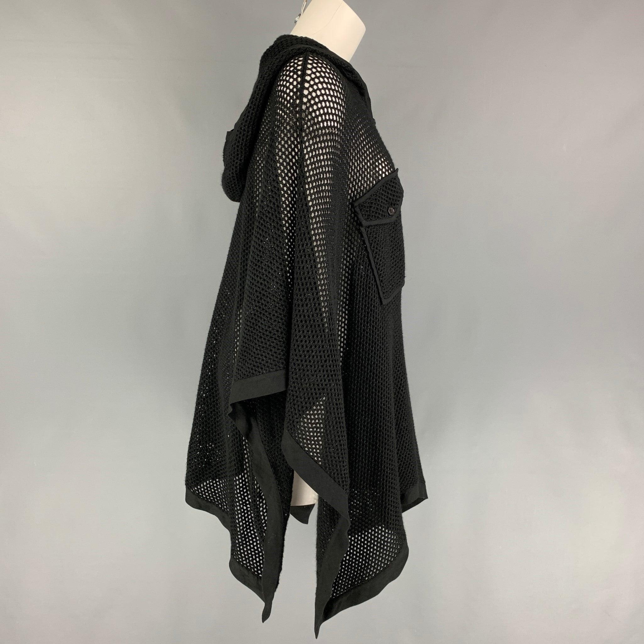 RALPH LAUREN Collection cape comes in a black mesh cotton featuring a poncho style, hooded, front pockets, and a half buttoned closure.
Very Good
Pre-Owned Condition. 

Marked:   M-L 

Measurements: 
  Length: 30 inches 
  
  
 
Reference: