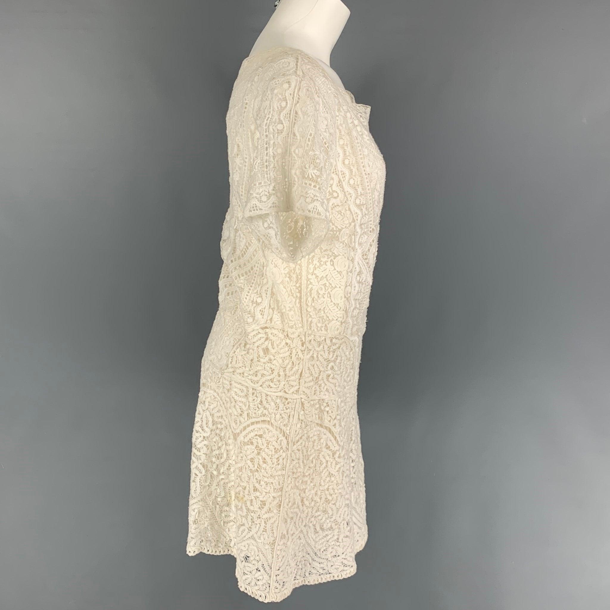 RALPH LAUREN Collection dress comes in a white crochet cotton with a slip liner featuring a shift style and a short sleeves.
Made in Italy. Very Good
Pre-Owned Condition.
Light wear. As-Is. Fabric tag removed.  

Marked:   M  

Measurements: 
