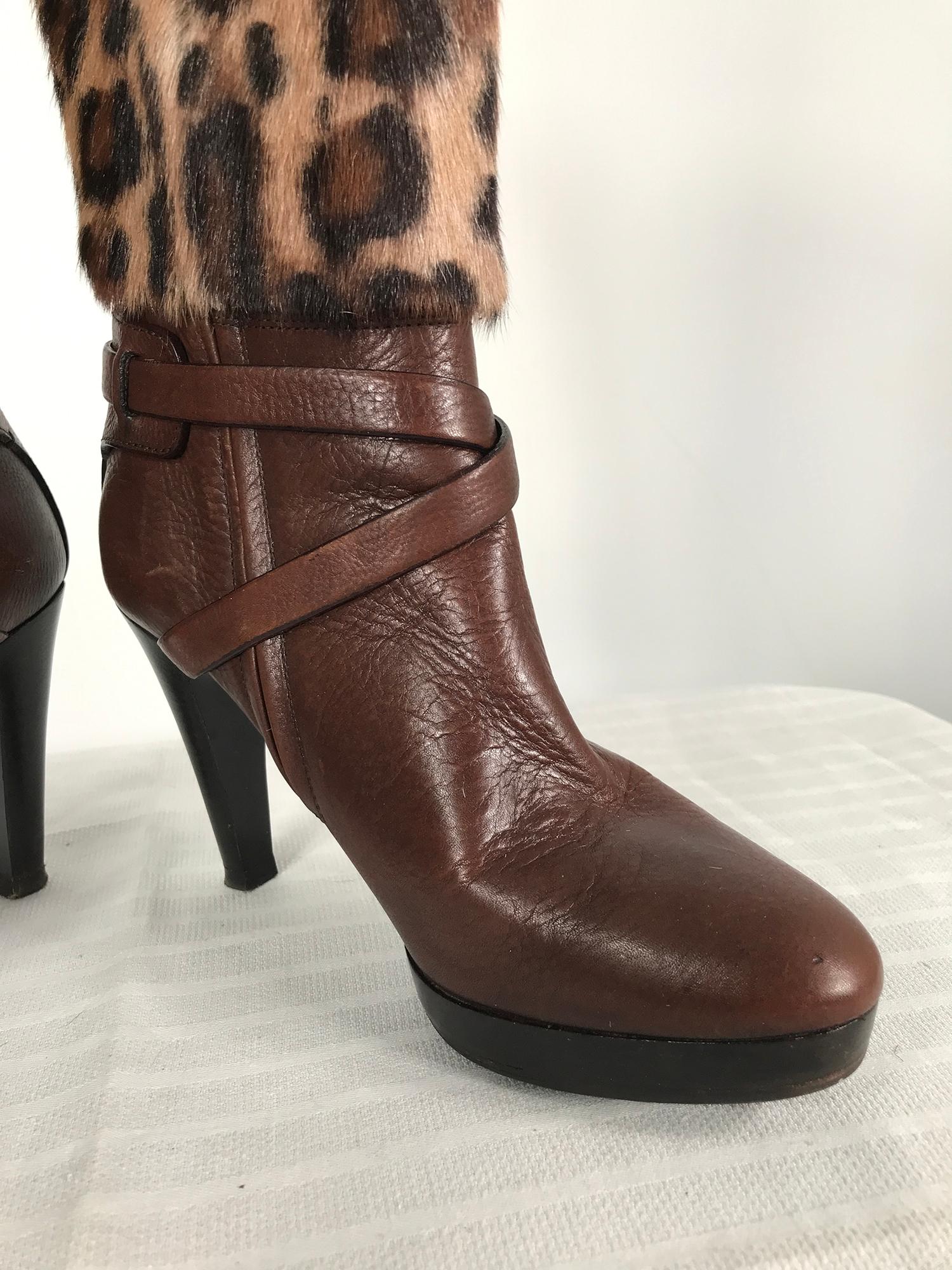 Ralph Lauren Collection spotted fur & leather high heel platform boots 8B. Knee high boots. Knee high boots that close on the side with a zipper and logo tab. The shaft of the boot is fur, the lower part of the boot is leather, there are straps that
