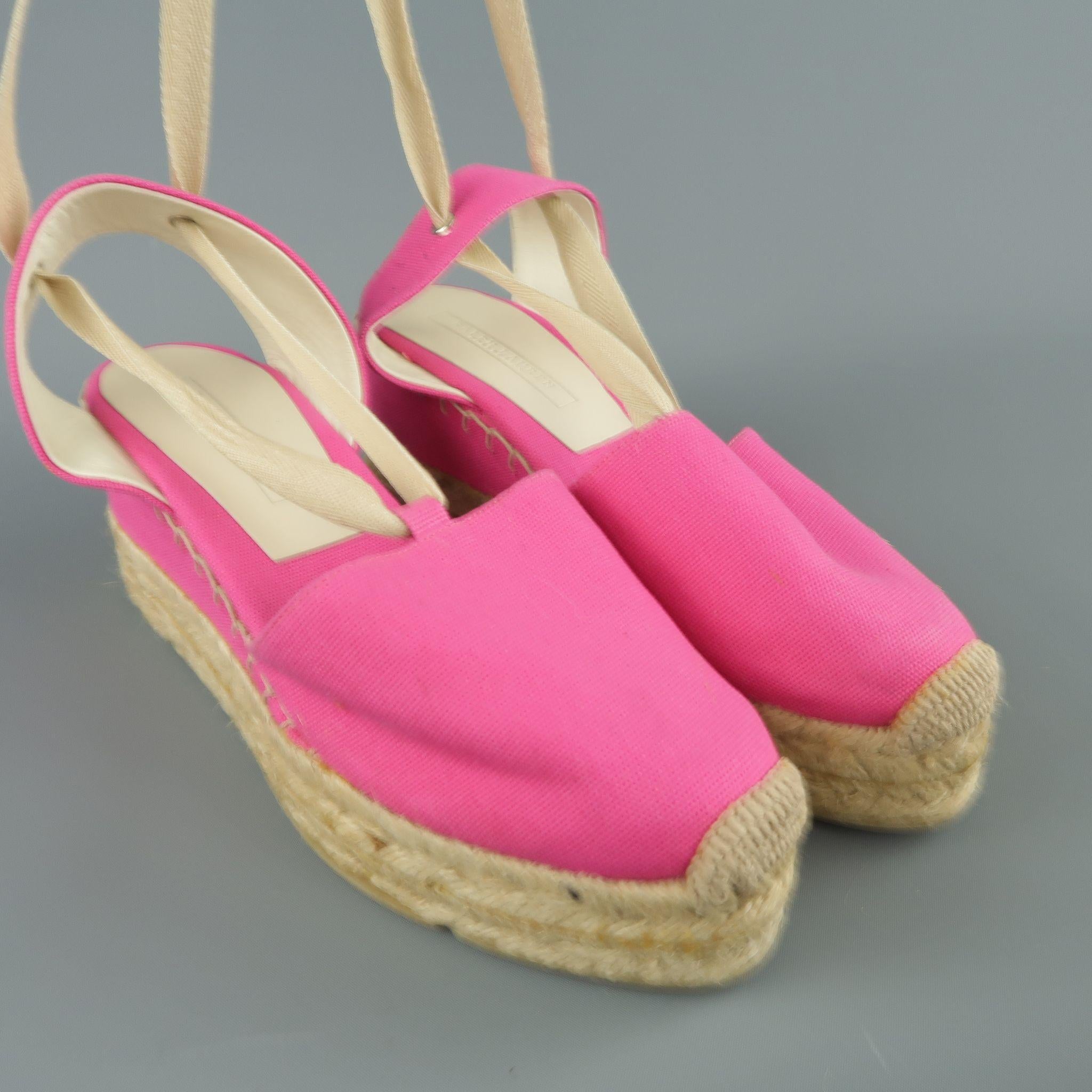 RALPH LAUREN COLLECTION espadrilles come in hot pink canvas with a slingback with ankle ties and platform wedge sole.  
 
Excellent Pre-Owned Condition.
Marked: 10
 
Heel: 2.5 in.
SKU: 88973
Category: Wedges

More Details
Brand: RALPH LAUREN
Size: