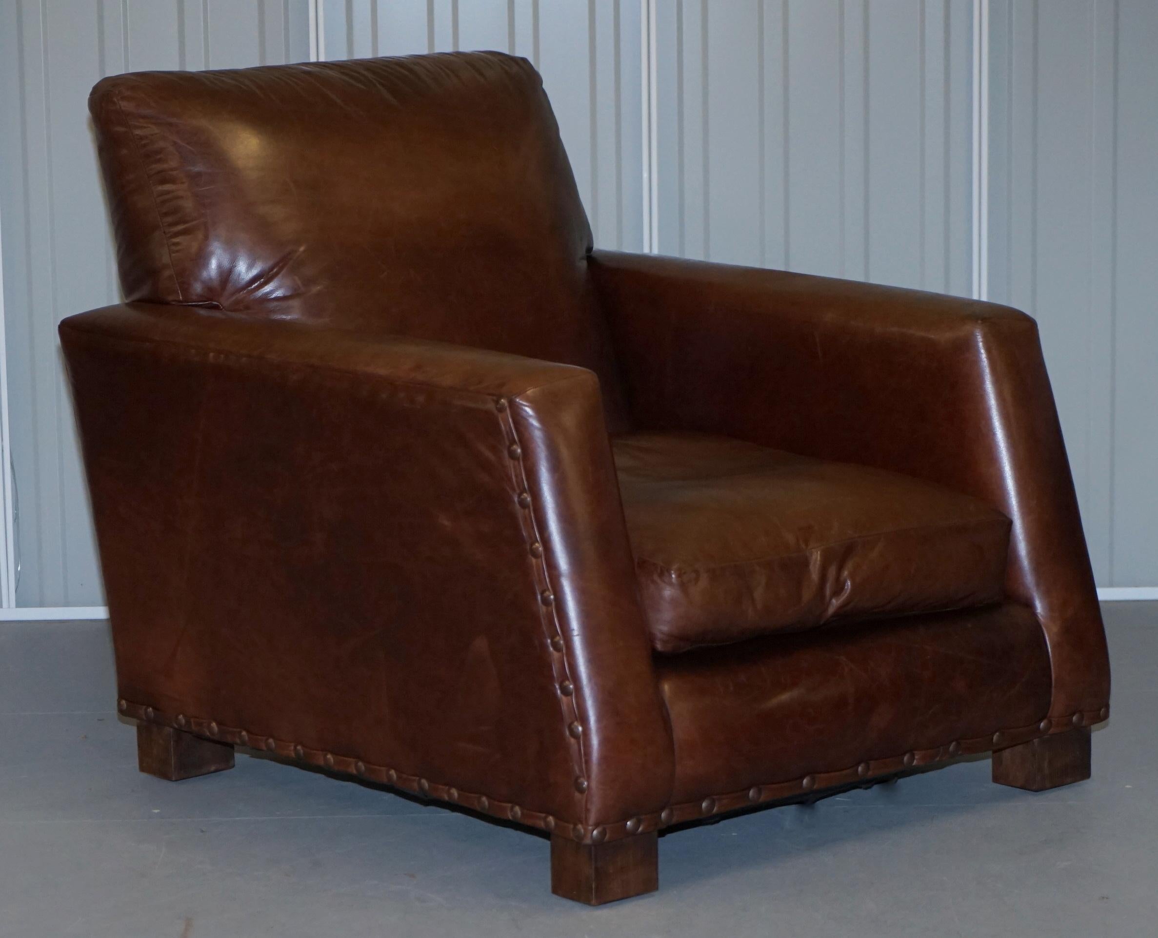 We are delighted to offer for sale this stunning vintage Ralph Lauren brown leather club armchair and matching ottoman 

A seriously comfortable pair in heritage buffalo brown leather with oversized antiqued studs

The pair have been lightly