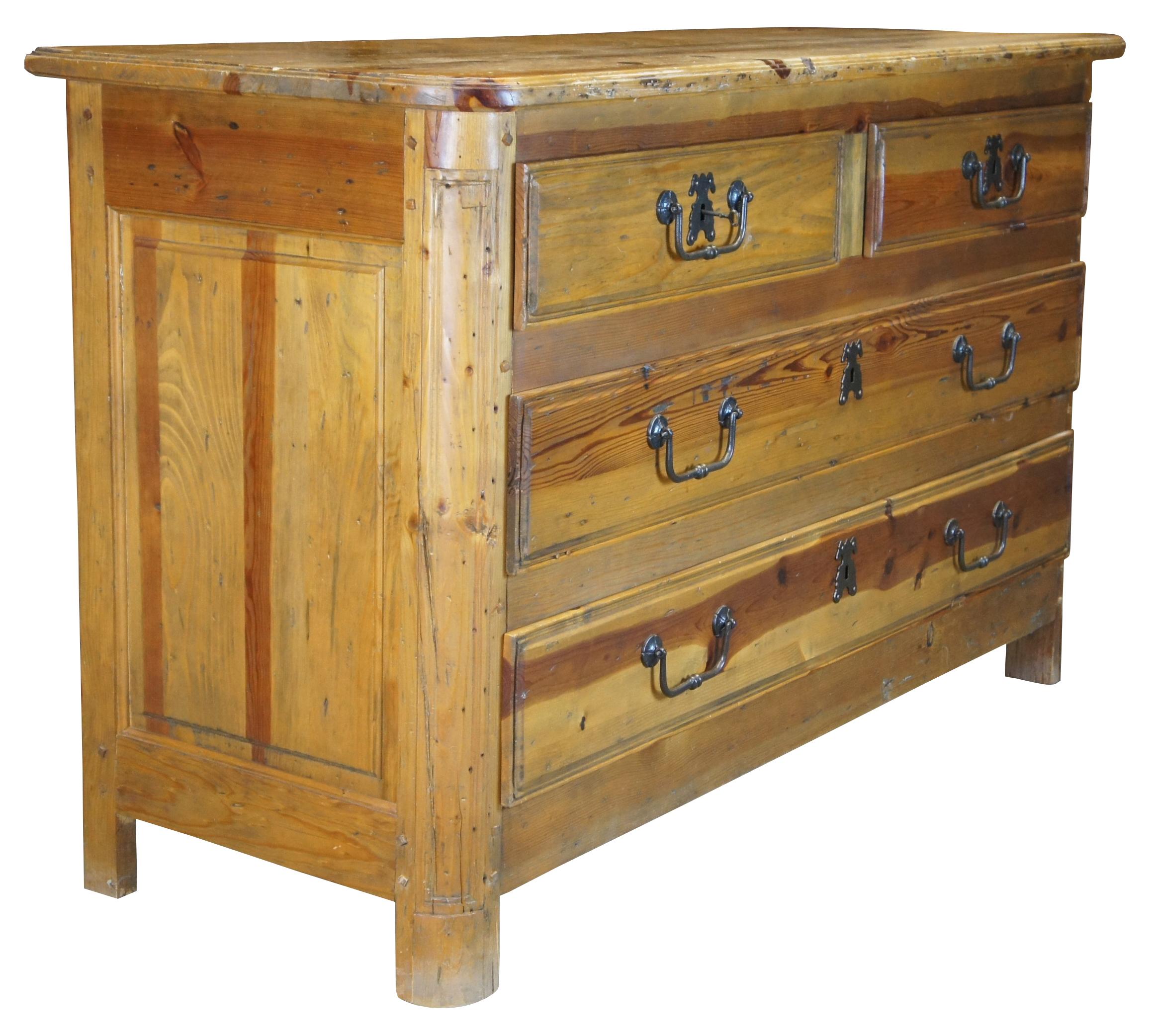 Ralph Lauren Estate Chest, circa 1990s. Made from naturally distressed solid rustic pine with an old world feel. An oversized stately rectangular form with a 2 over 2 drawer design. Each drawer is dovetailed and features classic colonial bale drawer