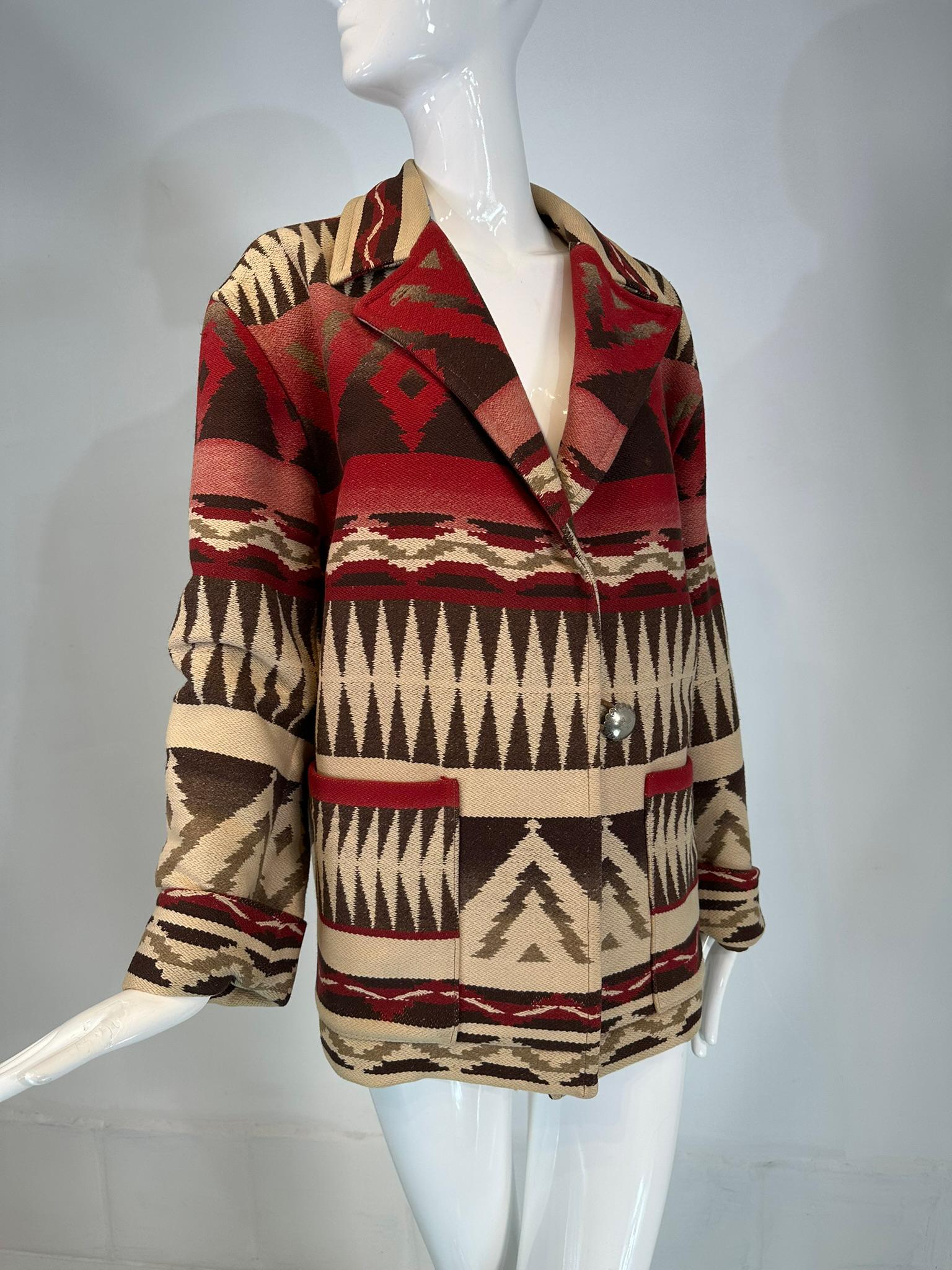 Ralph Lauren Country Santa Fe, Prairie Gypsy, Indian Blanket Jacket 1981. Marked size medium. Geometric design in beige, tan, black and brick red. Notched lapel collar. The jacket closes with a single silver metal concho button & suede loop.