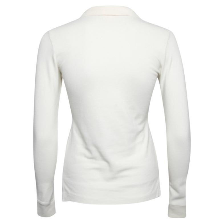 Poloshirts von Ralph Lauren sind seit jeher ein Klassiker für jedermann. Diese Version ist aus cremefarbenem Baumwoll-Piqué geschneidert und mit dem kultigen Logo und einer Knopfleiste versehen. Vervollständigen Sie Ihren Freizeitlook mit einer