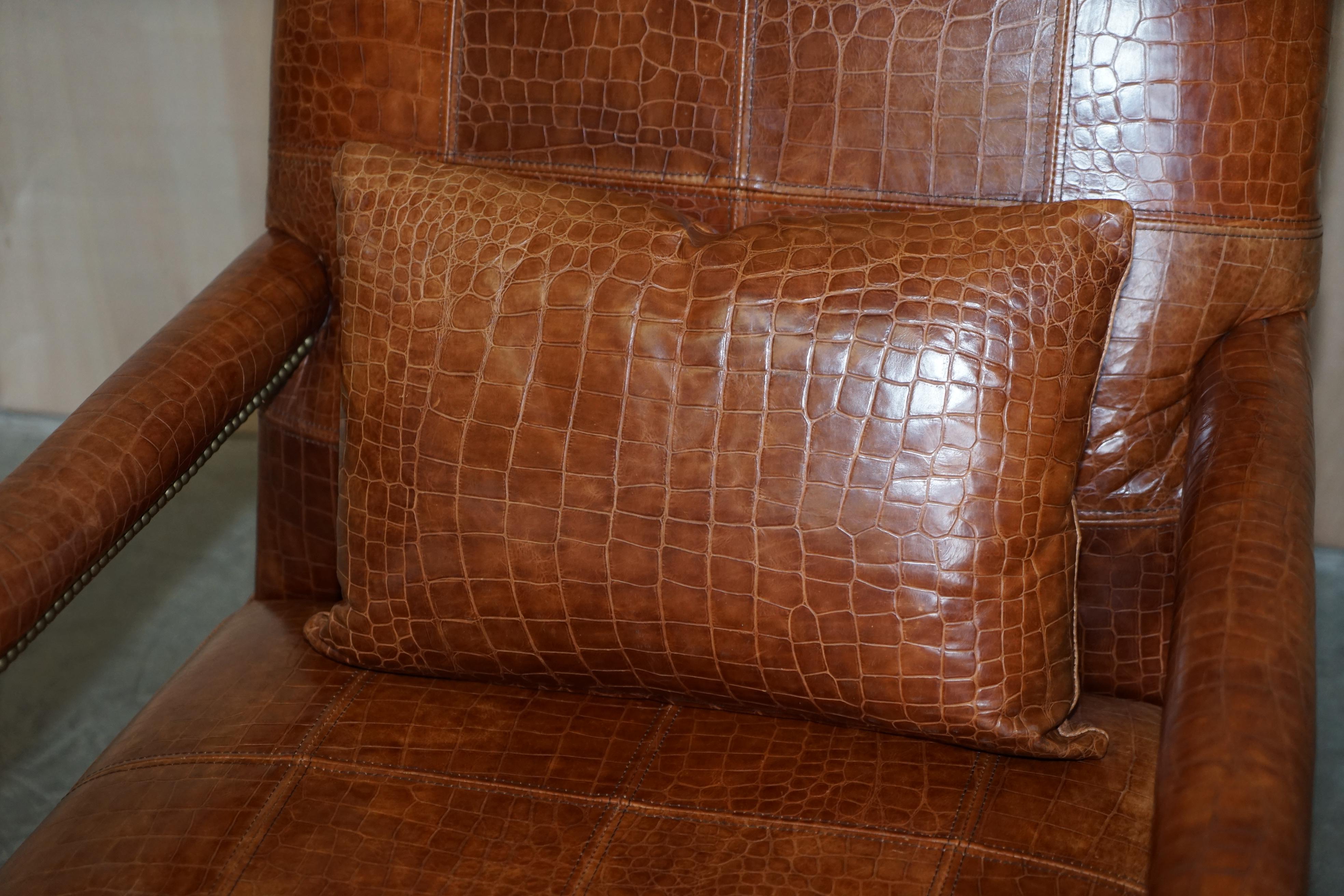 We are delighted to offer for sale this stunning Ralph Lauren Library reading armchair with Crocodile / Alligator patina brown leather upholstery

A very good looking and well made piece, I’ve only ever seen one other of these in all my time, the