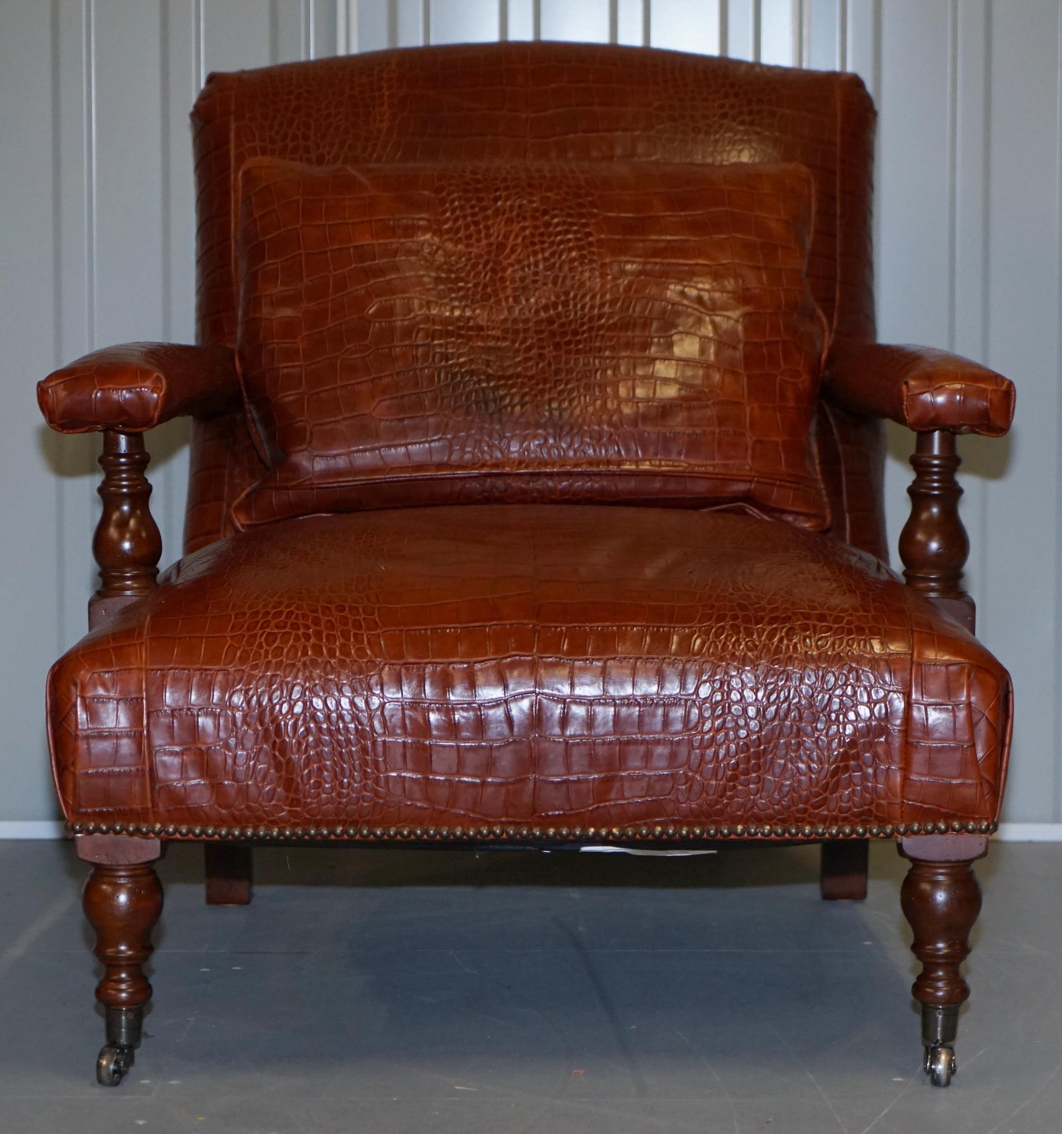 We are delighted to offer for sale this stunning original heritage brown Crocodile / Alligator patina leather Ralph Lauren Library reading armchair RRP £7000

A very good looking well made and comfortable armchair, the leather is a glorious rich