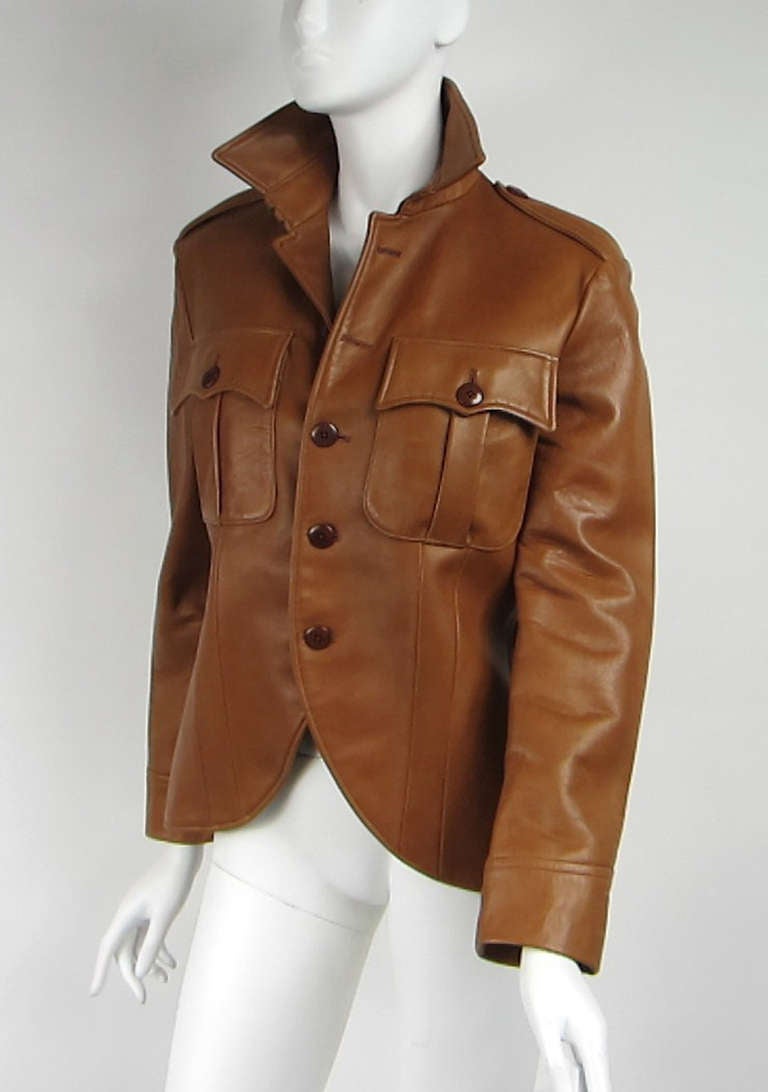 1990s Ralph Lauren Leather Jacket. Size 8. Up to 34 in.  bust Up to 27 waist Large Patch front pockets. Domestic Lamb Leather Two clips at the neck. Front button closures.  Be sure to check our store front for more fabulous pieces from this