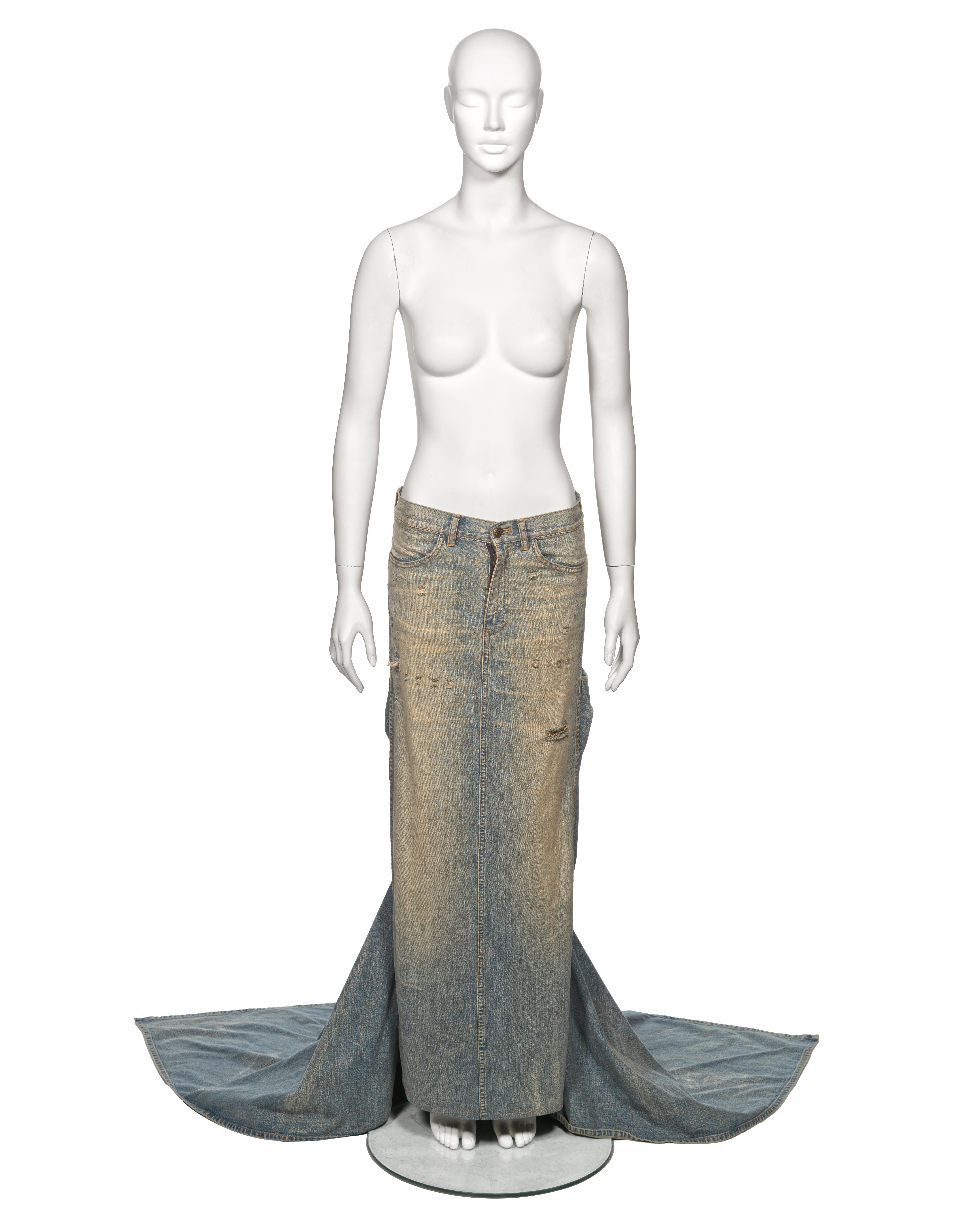 ▪ Archival Ralph Lauren Purple Label Runway Skirt
▪ Spring-Summer 2003
▪ Crafted from distressed heavyweight sand-washed denim
▪ Boasts a floor-length silhouette with two long trains extending to the rear
▪ Features a mid-rise waist with a straight