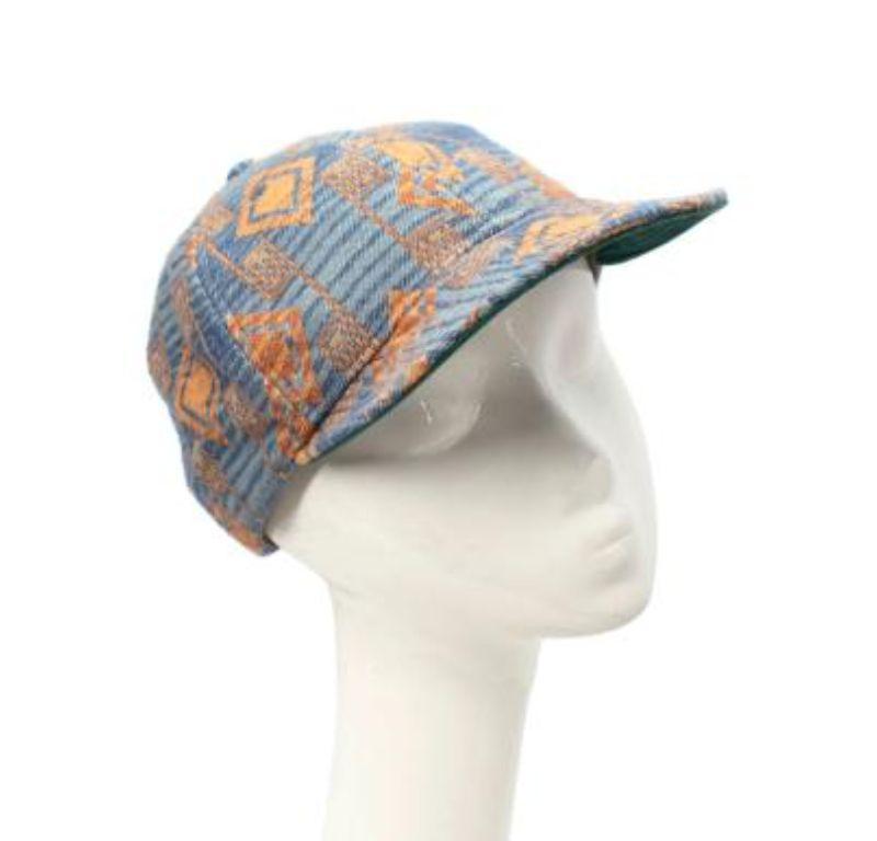 Ralph Lauren Double RL Blue & Copper Geometric Pattern Cotton Cap

- Cotton cap with geometric abstract pattern in two-tone blue and copper hue 
- Soft visor with green lining
- Adjustable leather back strap 

Materials:
100% Cotton
Calfskin