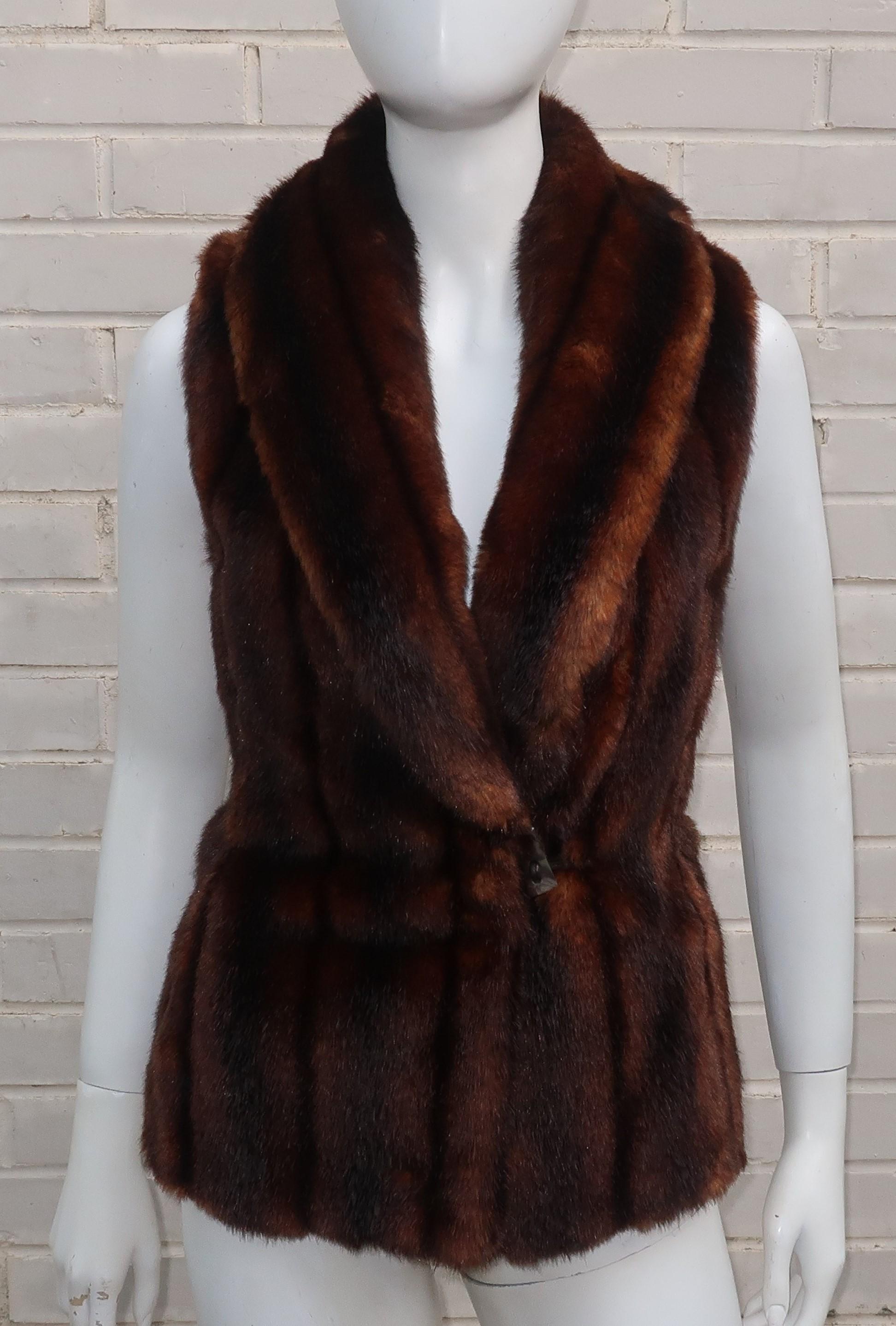 Faux fabulous!  A Lauren label faux brown mink fur vest with a crossover opening, shawl collar and a leather toggle closure accented by a faux horn button.  Fun for everything from jeans to tweeds and woolens.  Acquired from the assets of a Fox
