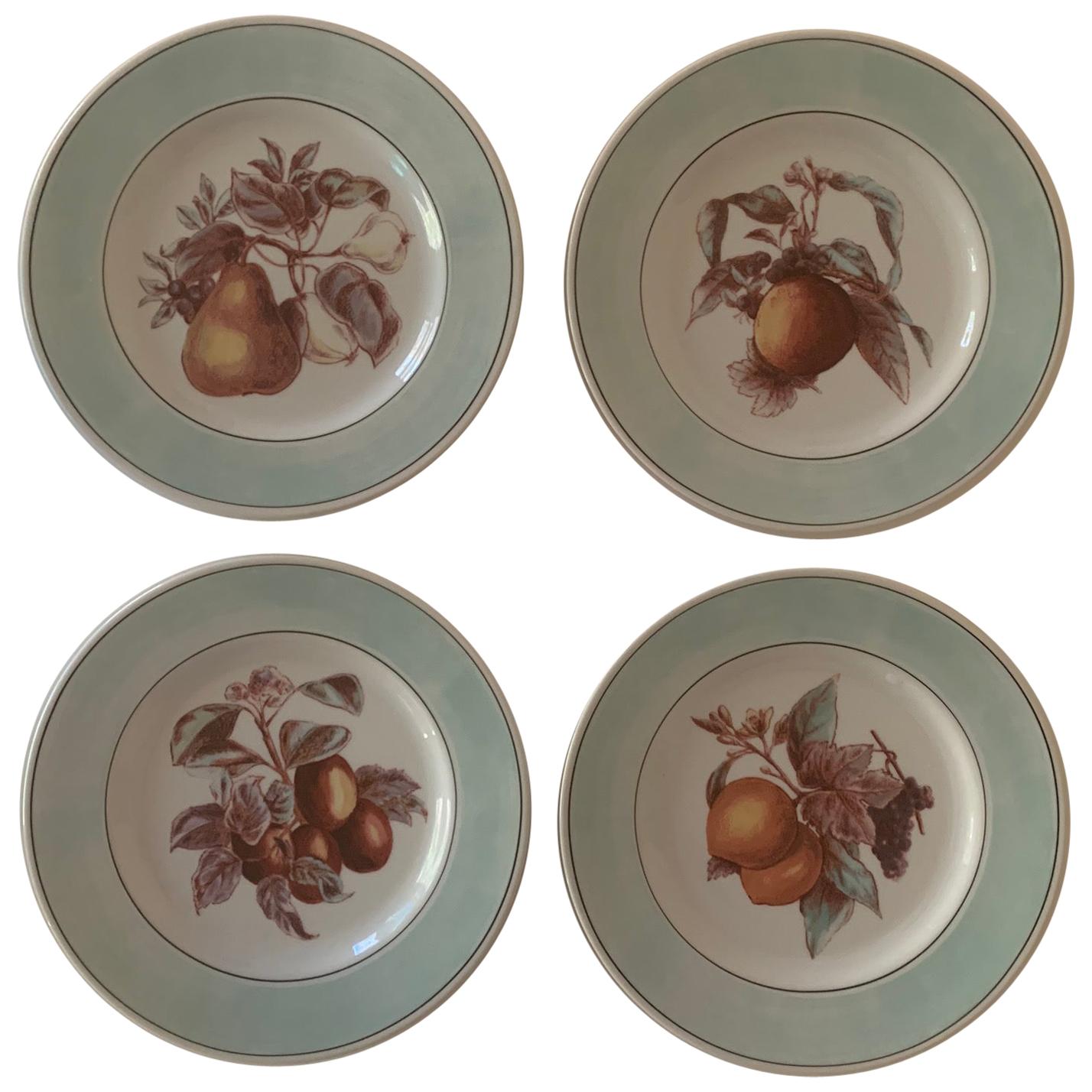 A set of four (4) dessert or salad plates by Lauren Home for Ralph Lauren in the Fruit Blossom pattern. Signed. Two dishes retain original tag.

Features four different variations of florals; numbered I, II, III and IV.

Each dish measures 8