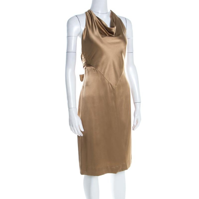 You will love the way you look when you slip this dress on. It is a Ralph Lauren design, wonderfully tailored from satin and designed with a cowl halter neckline and a tie at the back. A pair of gold sandals will complete it to