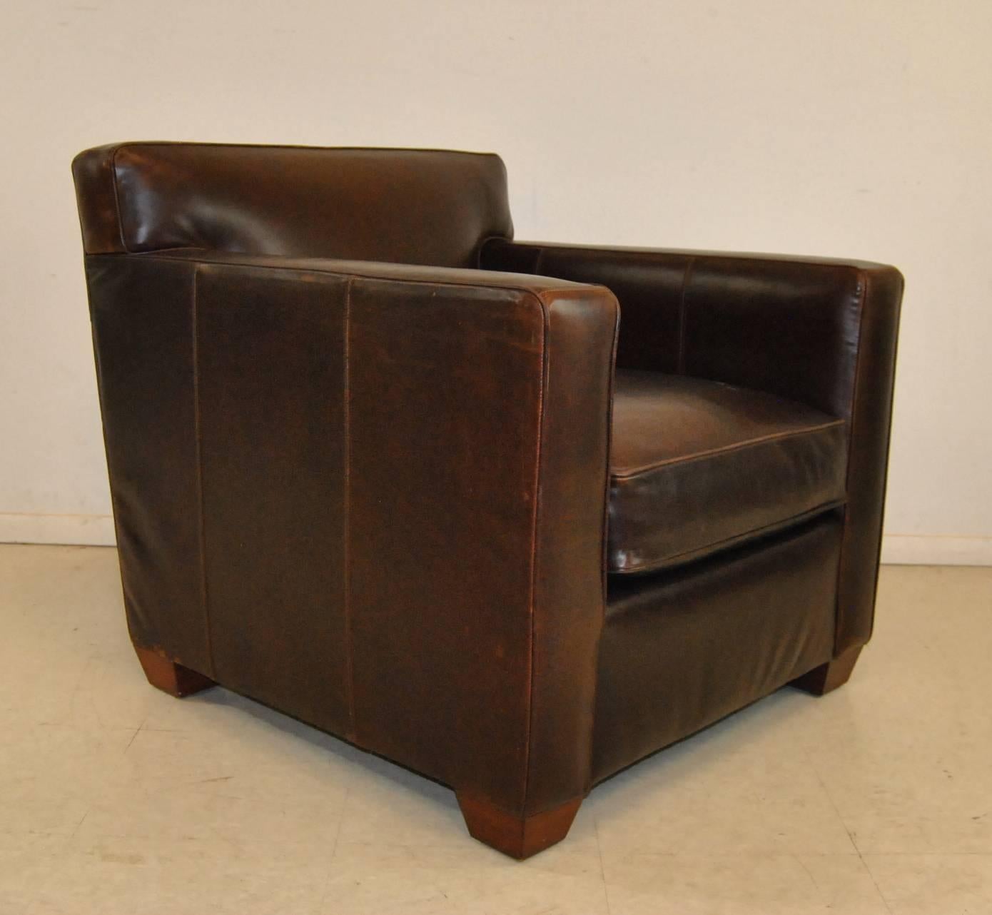 A beautiful custom ordered Ralph Lauren Graham armchair in distressed brown leather. This piece has been ordered with the fully upholstered sprung back as opposed to a cushion which comes standard. It is slightly more expensive but more durable. The