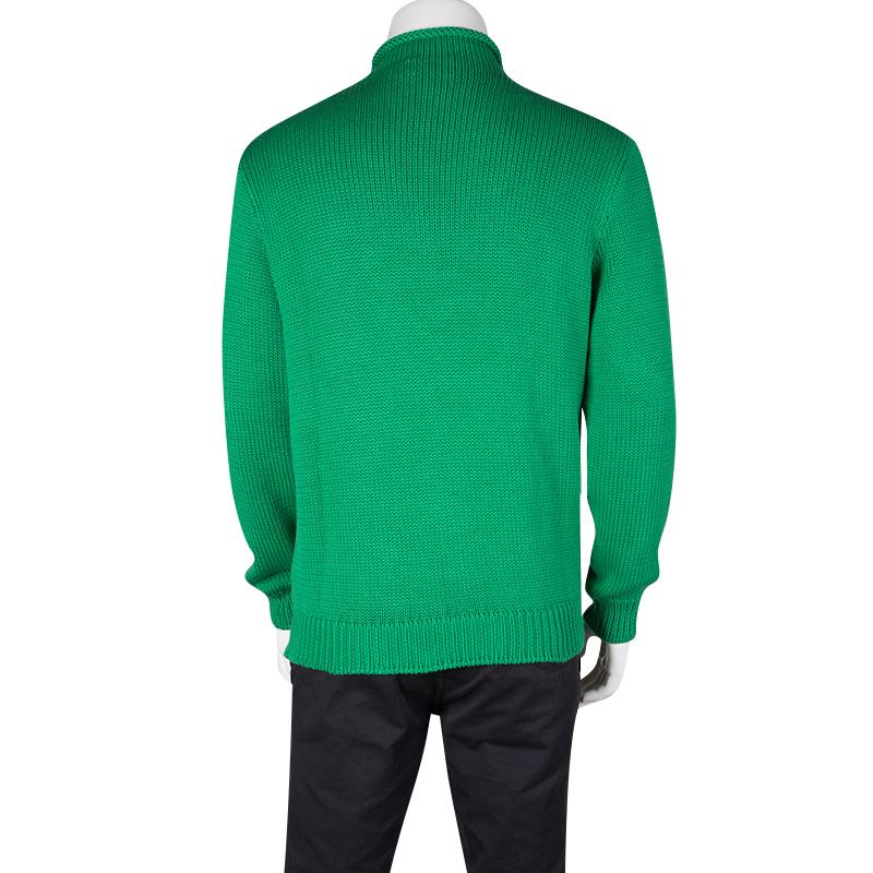 Designed in a gorgeous green hue, this Ralph Lauren sweater features a cotton chunky knit and a high neckline. It comes with full sleeves with ribbing on the cuffs and neck. Team this solid piece with a blazer or throw over a printed scarf for an