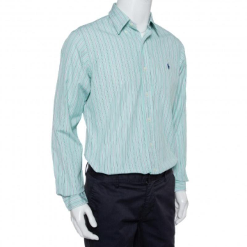 Ralph Lauren shirts are designed with a focus on both comfort and luxury so that you can wear them for a long time. This green number is tailored from cotton and cut for a custom fit. Long cuff sleeves, logo embroidery, full front buttons, and a