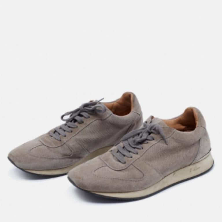 These sneakers from the House of Ralph Lauren are super sturdy, stunning, and stylish. They are crafted from grey suede and mesh into a low-top silhouette. They showcase lace-up fastenings on the vamps. Add these trendy sneakers to your collection