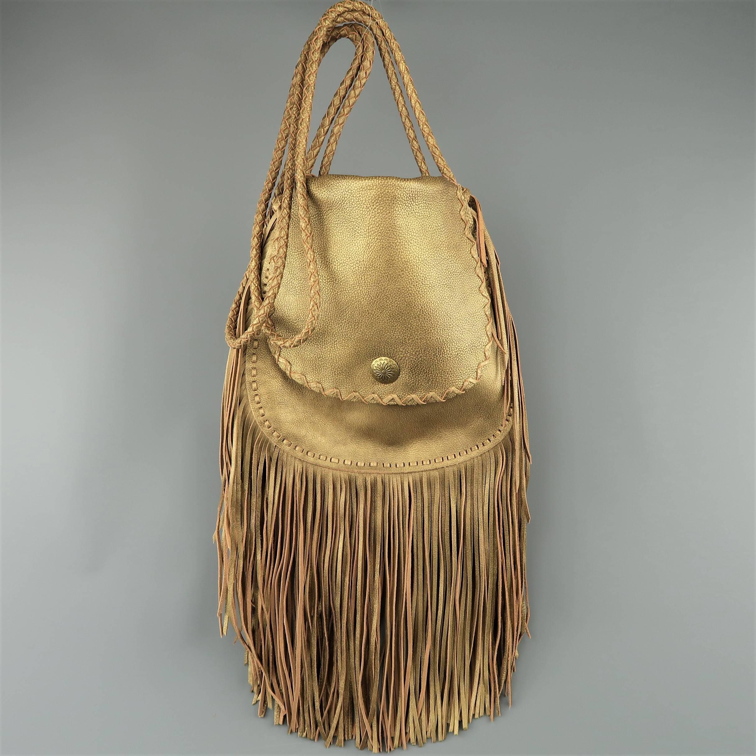 Ralph Lauren handbag comes in dark metallic gold textured leather and features a sack with flap button closure, whipstitch trim, braided double crossbody straps, and long fringe.
 
Excellent Pre-Owned Condition.
 
Measurements:
 
Length: 11.5