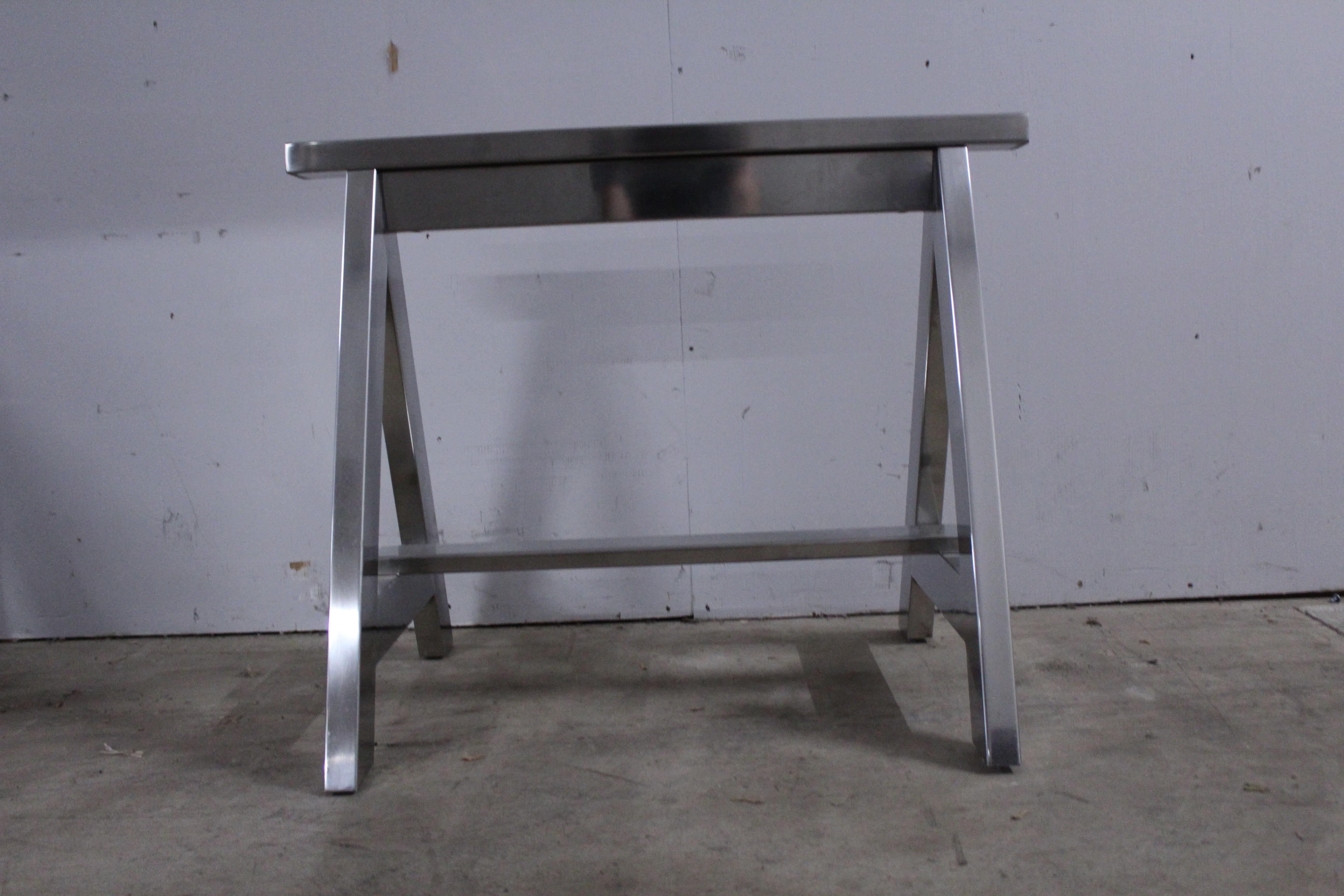 Set of Ralph Lauren Highbridge polished stainless steel sawhorse desk legs in excellent condition. May be used as a desk, dining table, utility table, or small conference table.