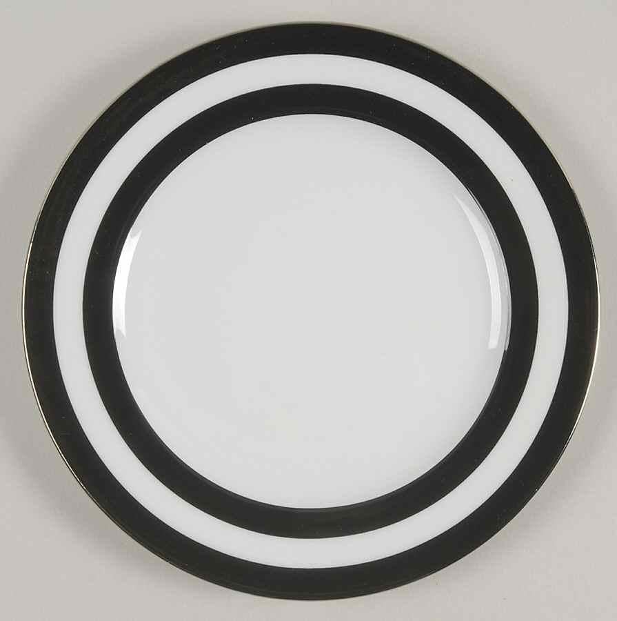 A set of 8 (eight) place settings in the spectator cadet black pattern by Ralph Lauren Home Collection for Wedgwood. Porcelain. Signed, circa 1995-1996.

White with black wide stripe border and silver trim.

A total of 40 total pieces; includes the